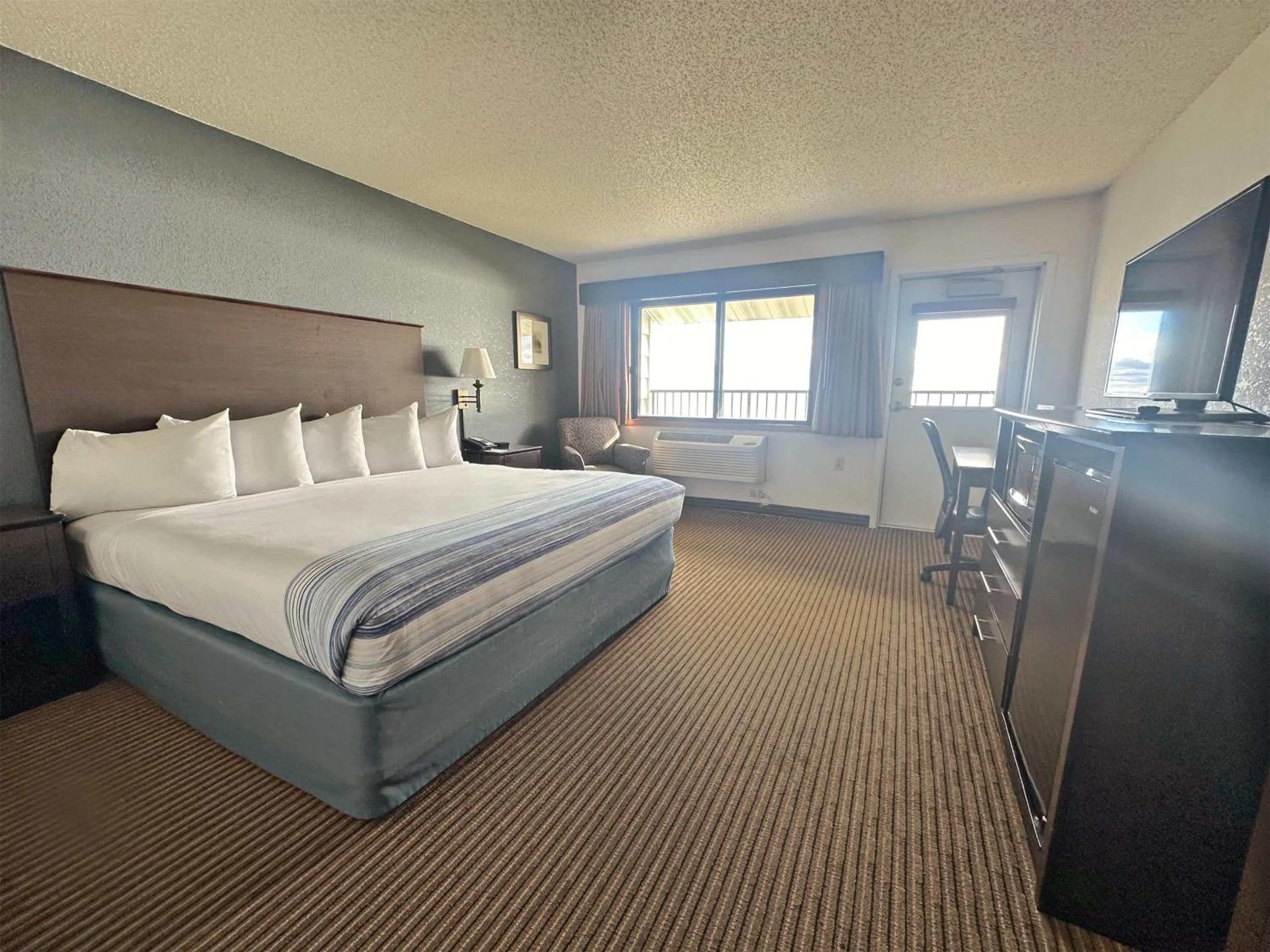 Photo of the whole room, Bed in AmericInn by Wyndham Menominee