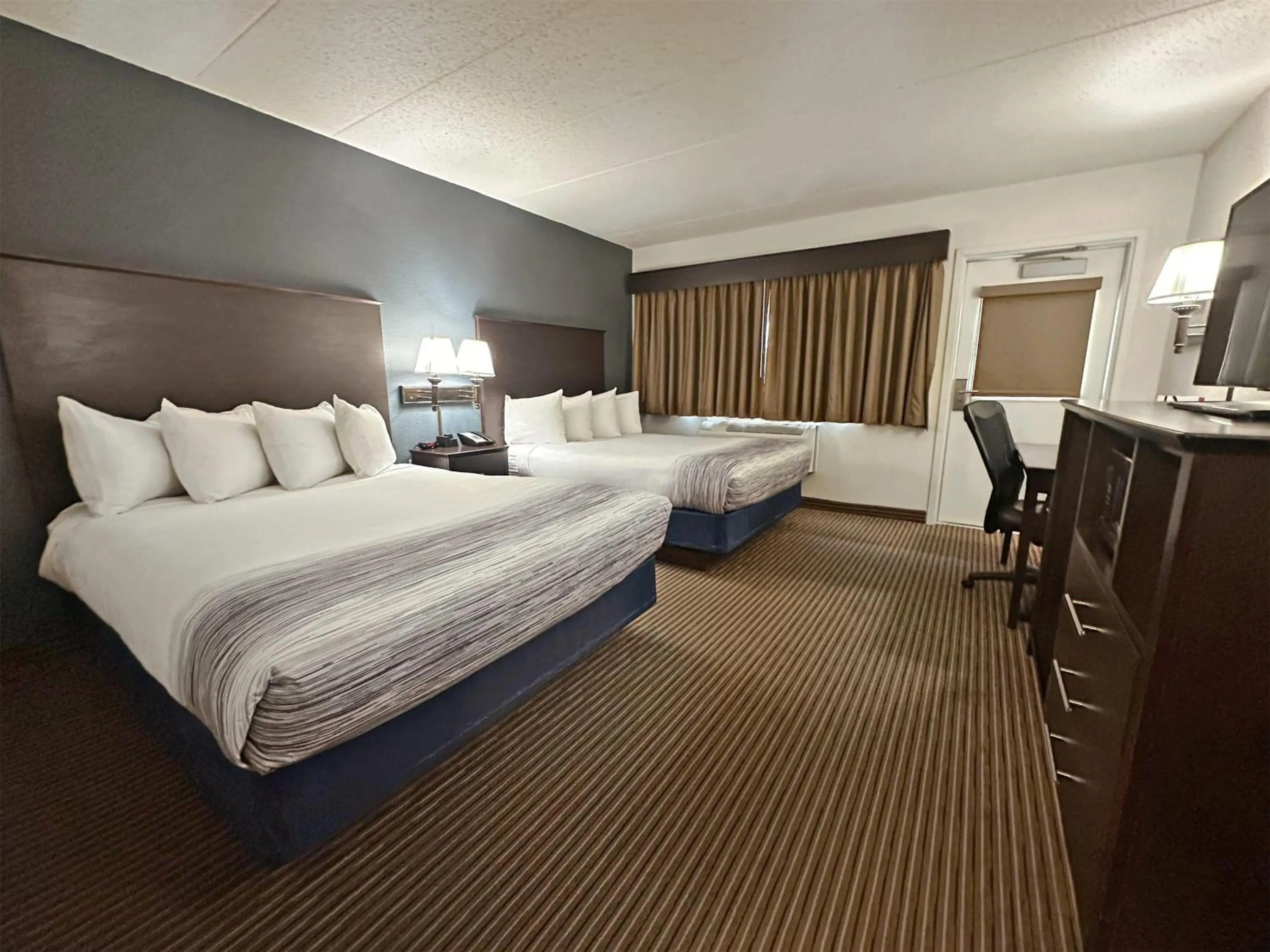 Photo of the whole room, Bed in AmericInn by Wyndham Menominee