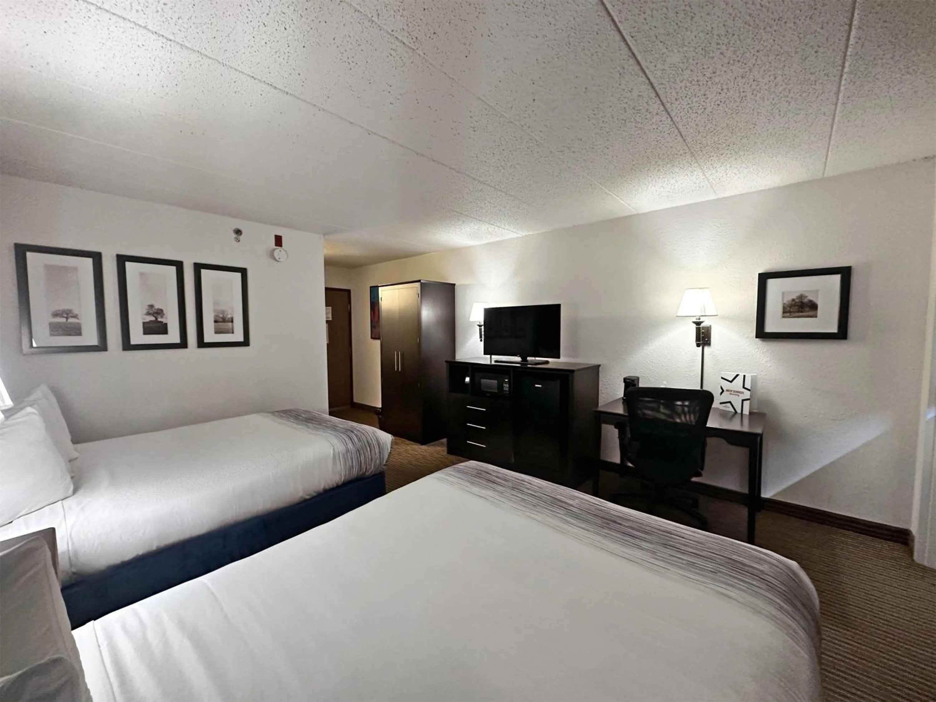 Photo of the whole room, Bed in AmericInn by Wyndham Menominee