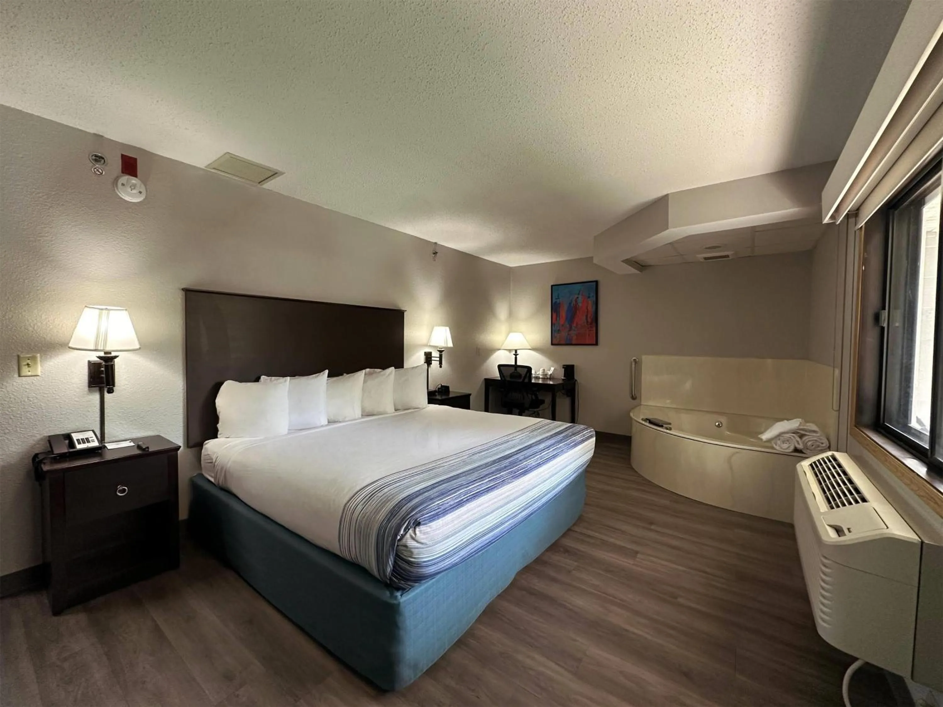 Photo of the whole room, Bed in AmericInn by Wyndham Menominee