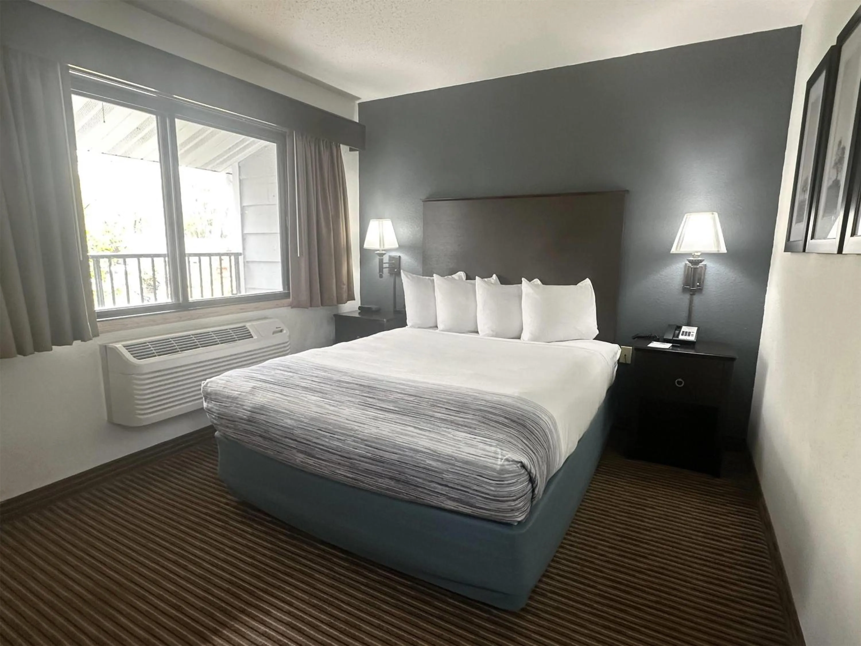 Photo of the whole room, Bed in AmericInn by Wyndham Menominee