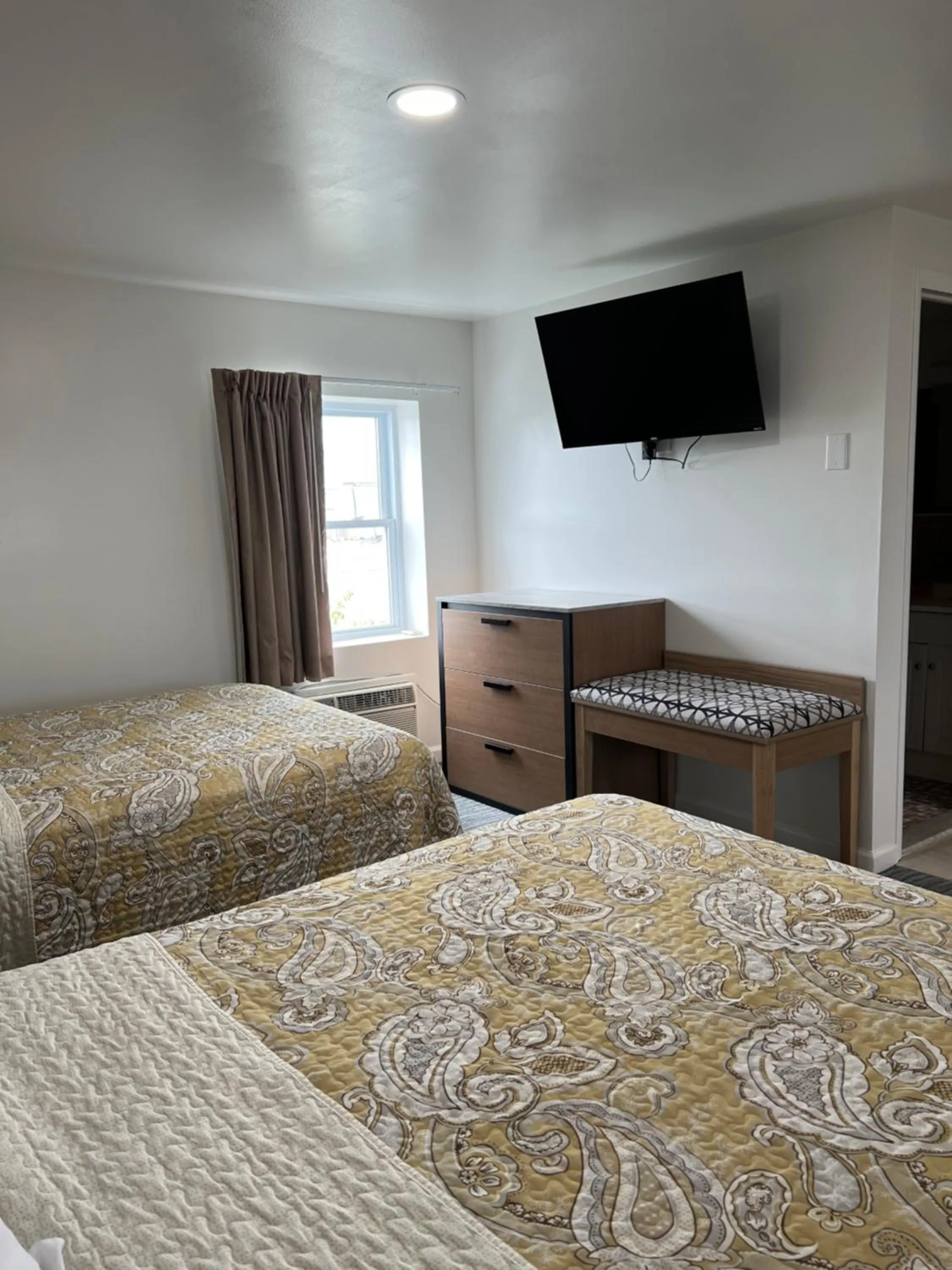 Bed in Crystal Sands Motel