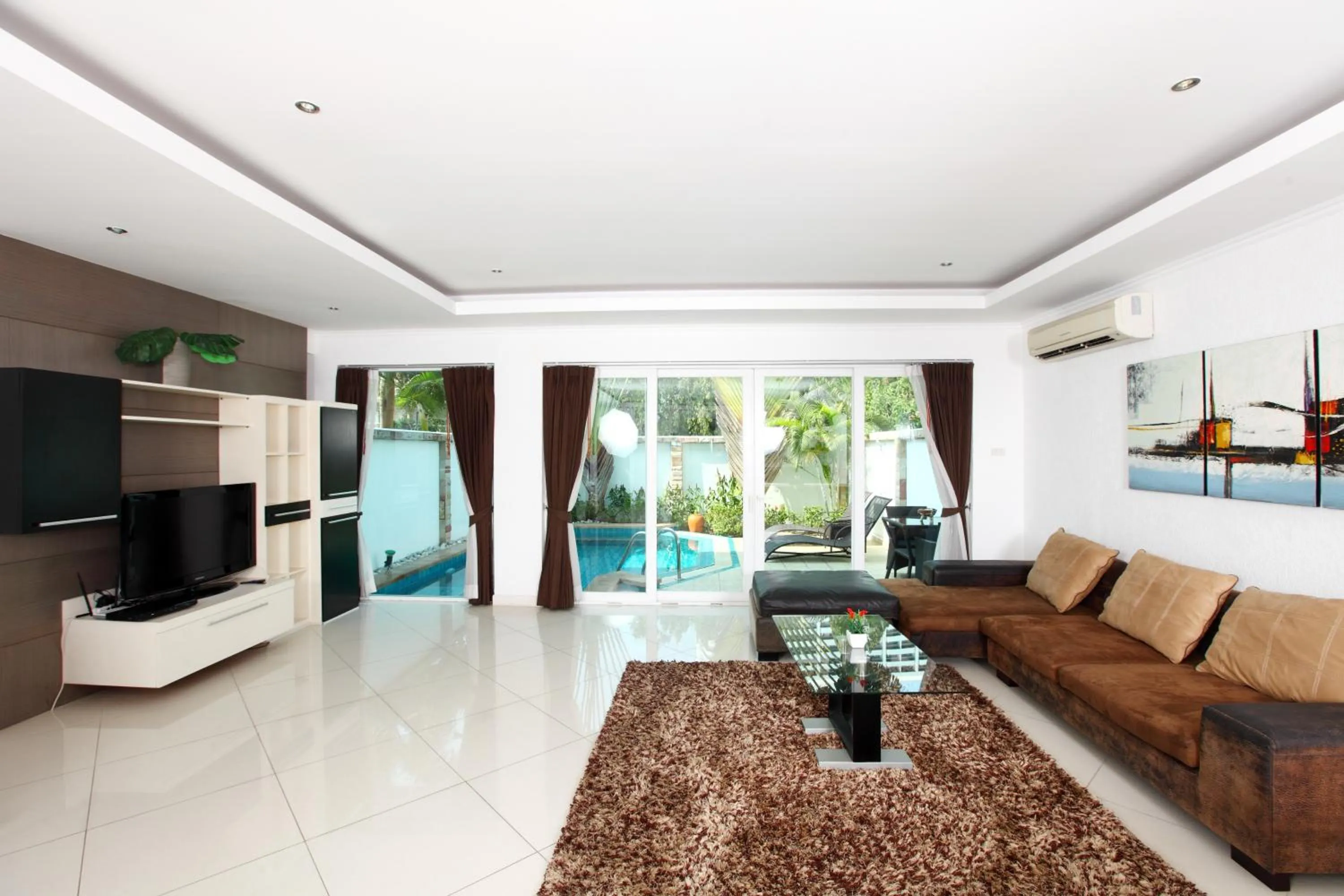Living room in Wongamat Pool Villas By Pattaya Sunny Rentals