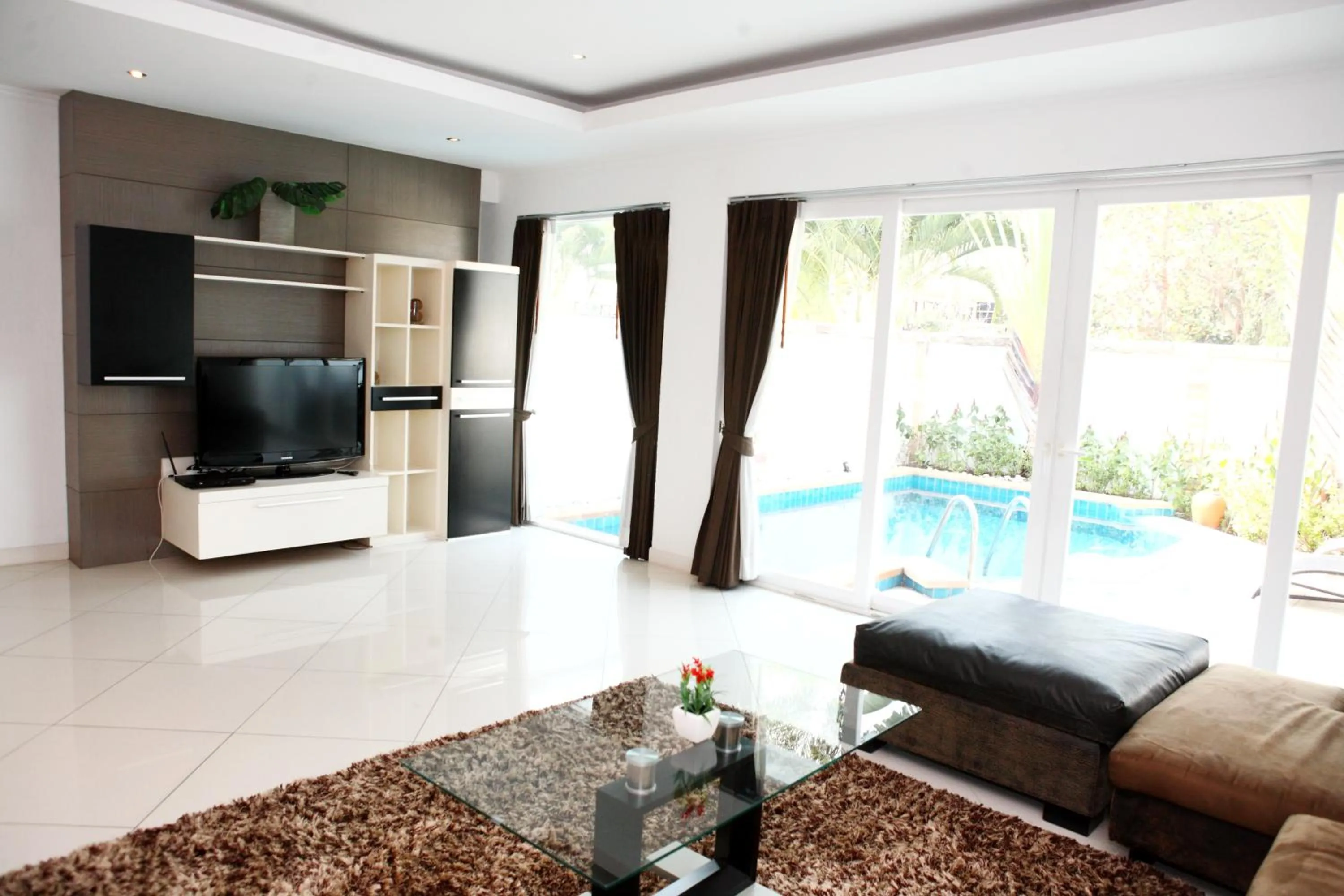 Living room in Wongamat Pool Villas By Pattaya Sunny Rentals
