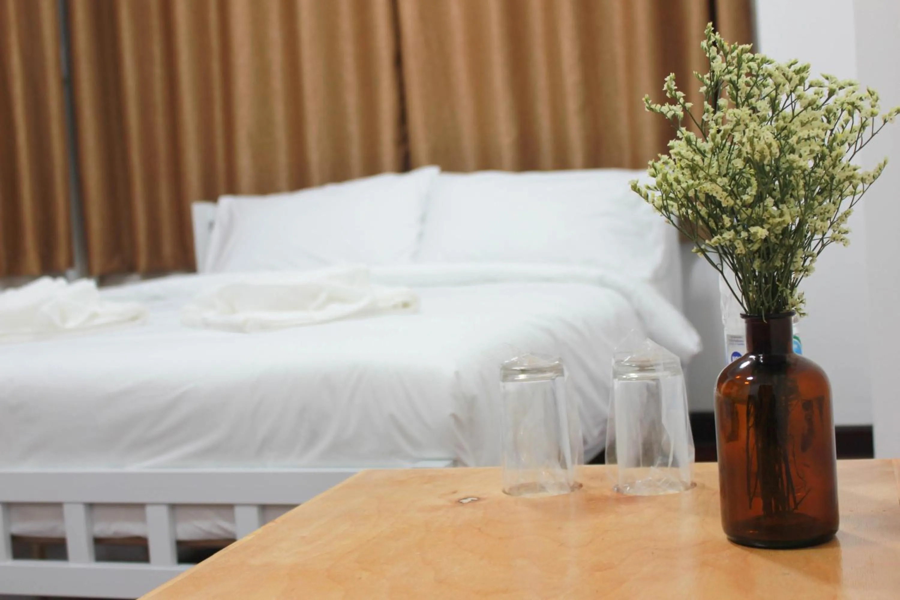 Bed in HOME@HOSTEL KANCHANABURI