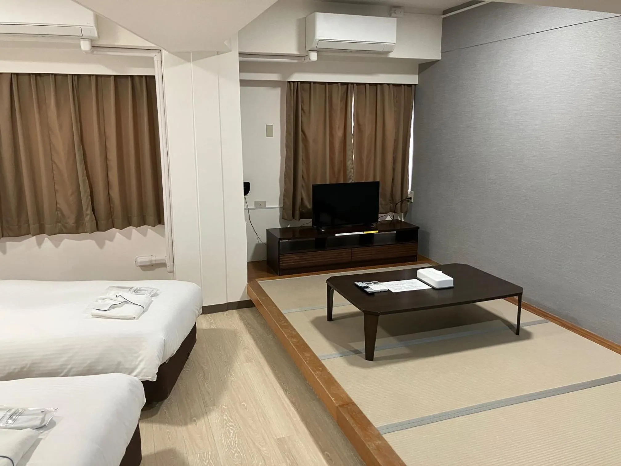 Bed in Enagic Okinawa Kokusai Plaza Hotel