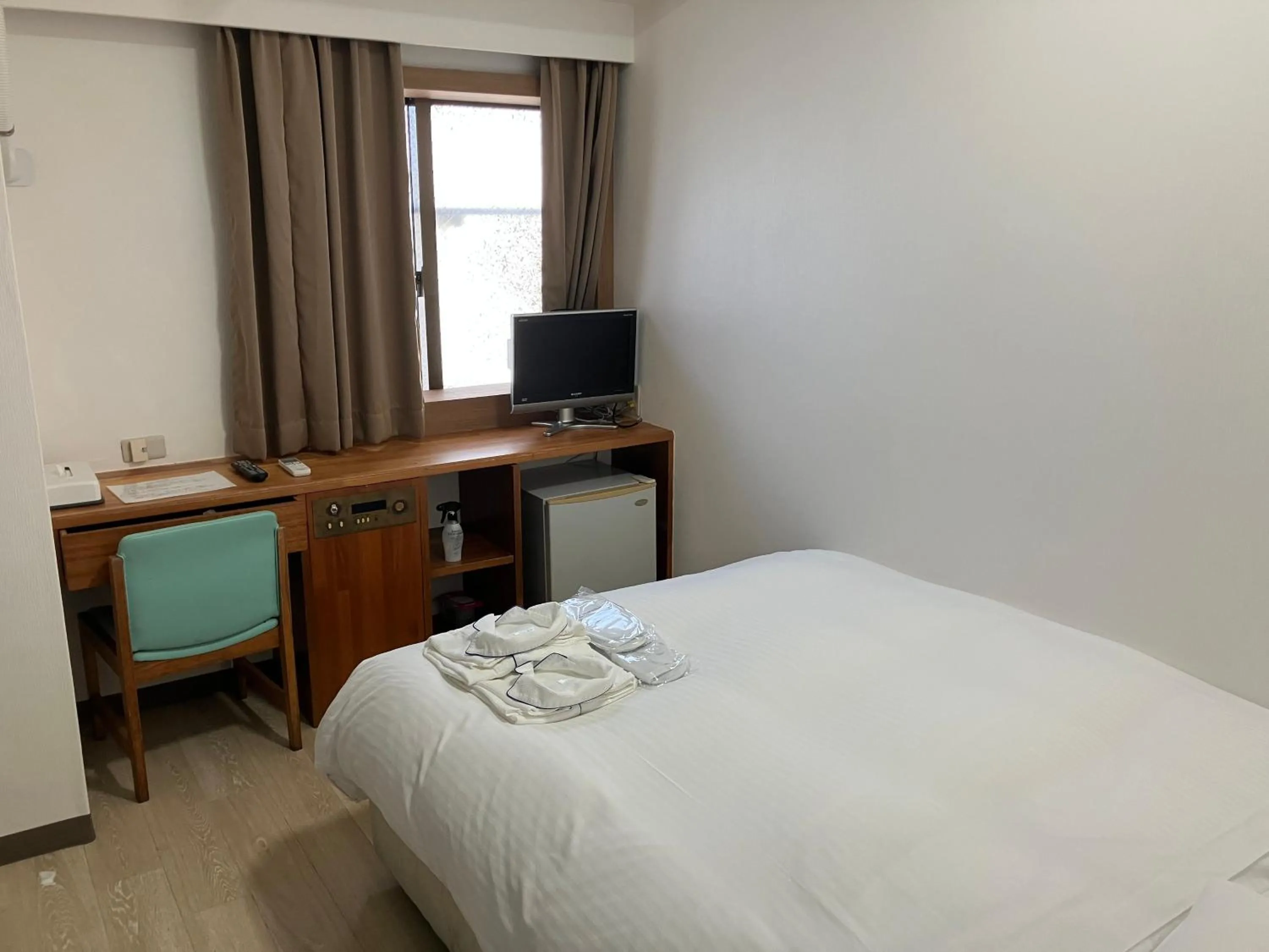 Bed in Enagic Okinawa Kokusai Plaza Hotel