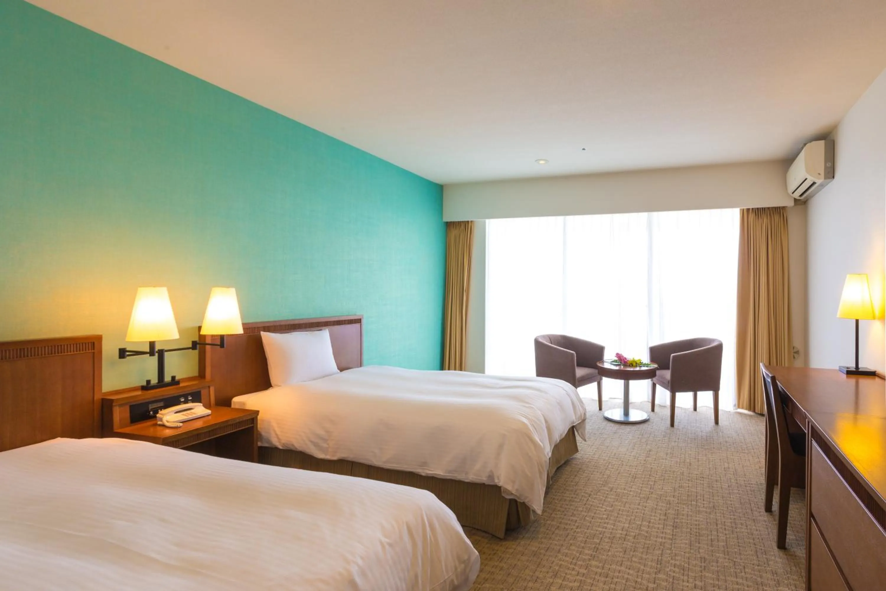 Bed in EM Wellness Kurashinohakko Lifestyle Resort