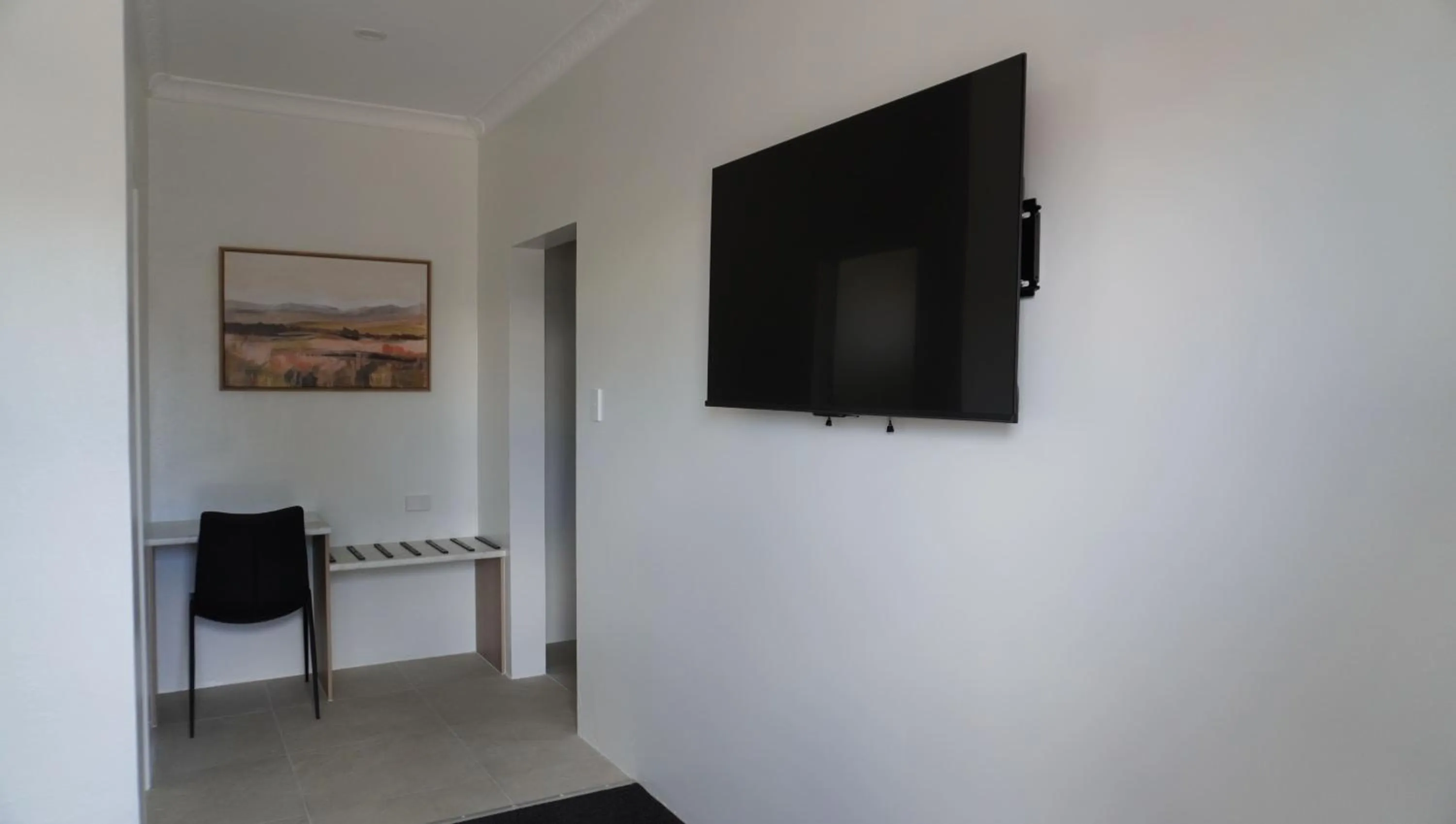 Communal lounge/ TV room in Abbotsleigh Motor Inn