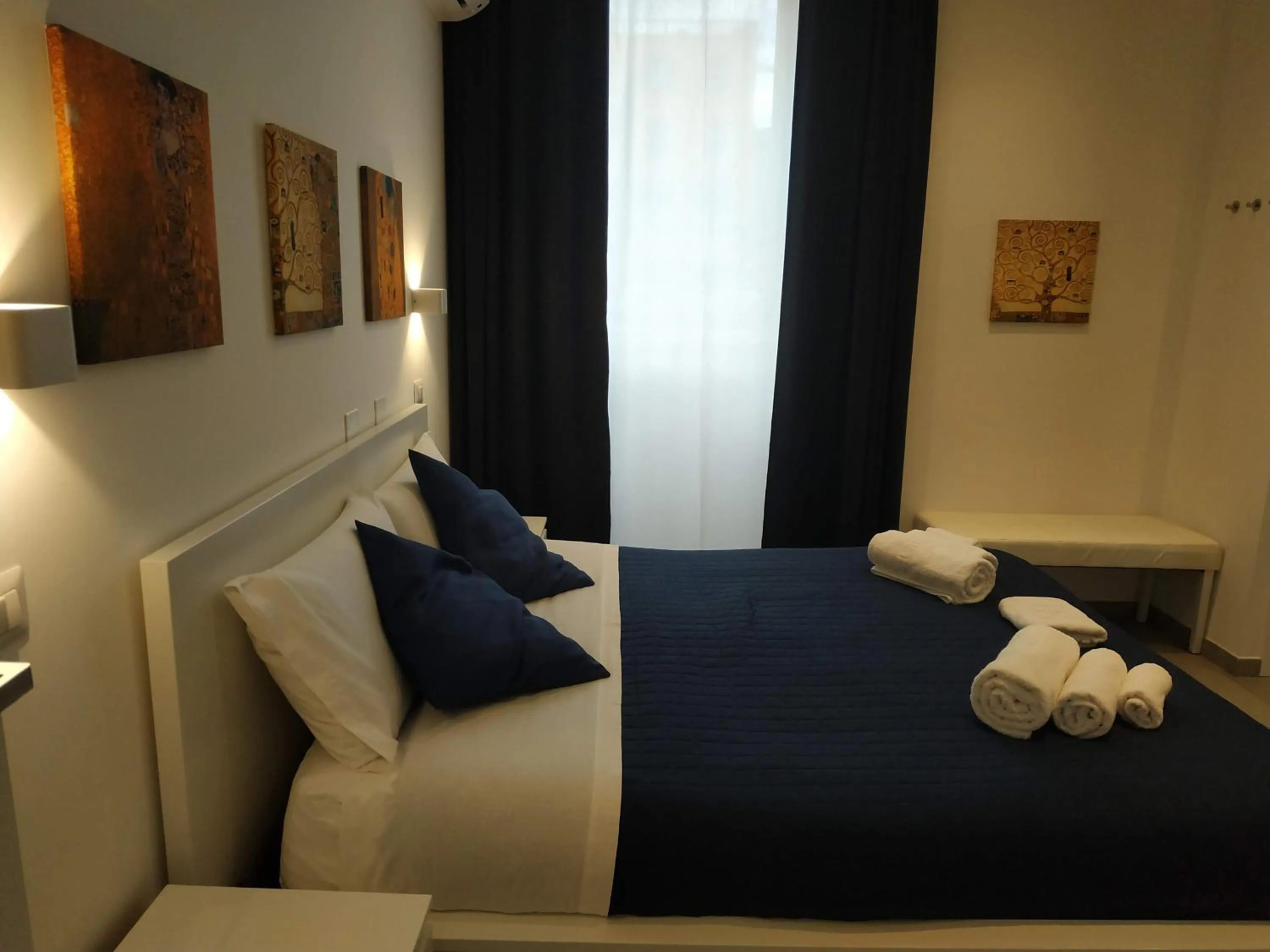 Bed in Palazzo Verdi Holiday Viterbo