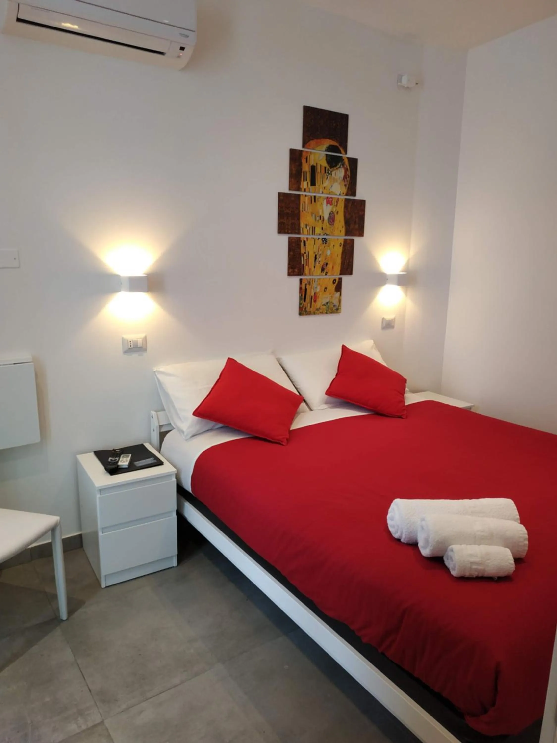 Bed in Palazzo Verdi Holiday Viterbo