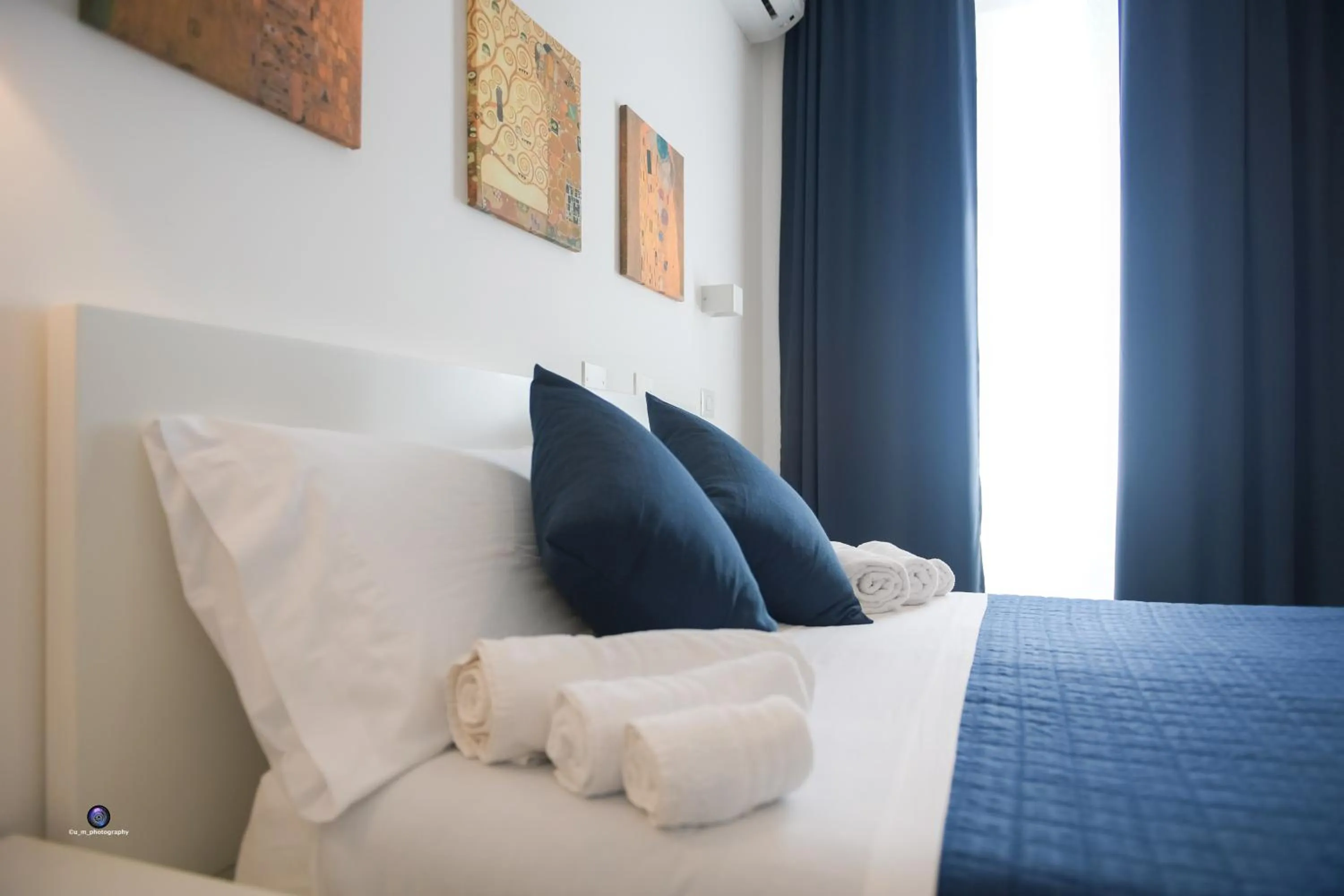 Bed in Palazzo Verdi Holiday Viterbo