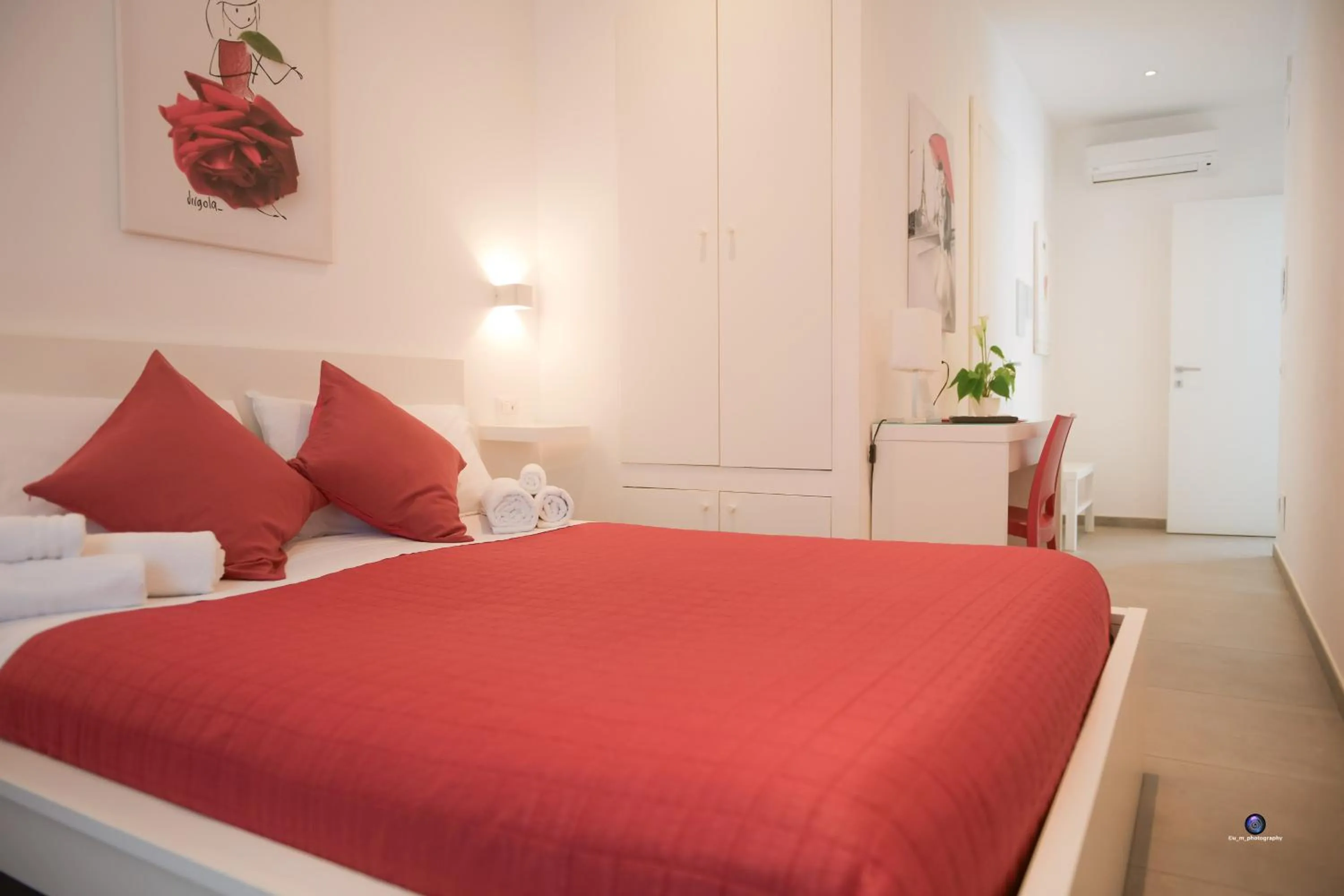 Bed in Palazzo Verdi Holiday Viterbo