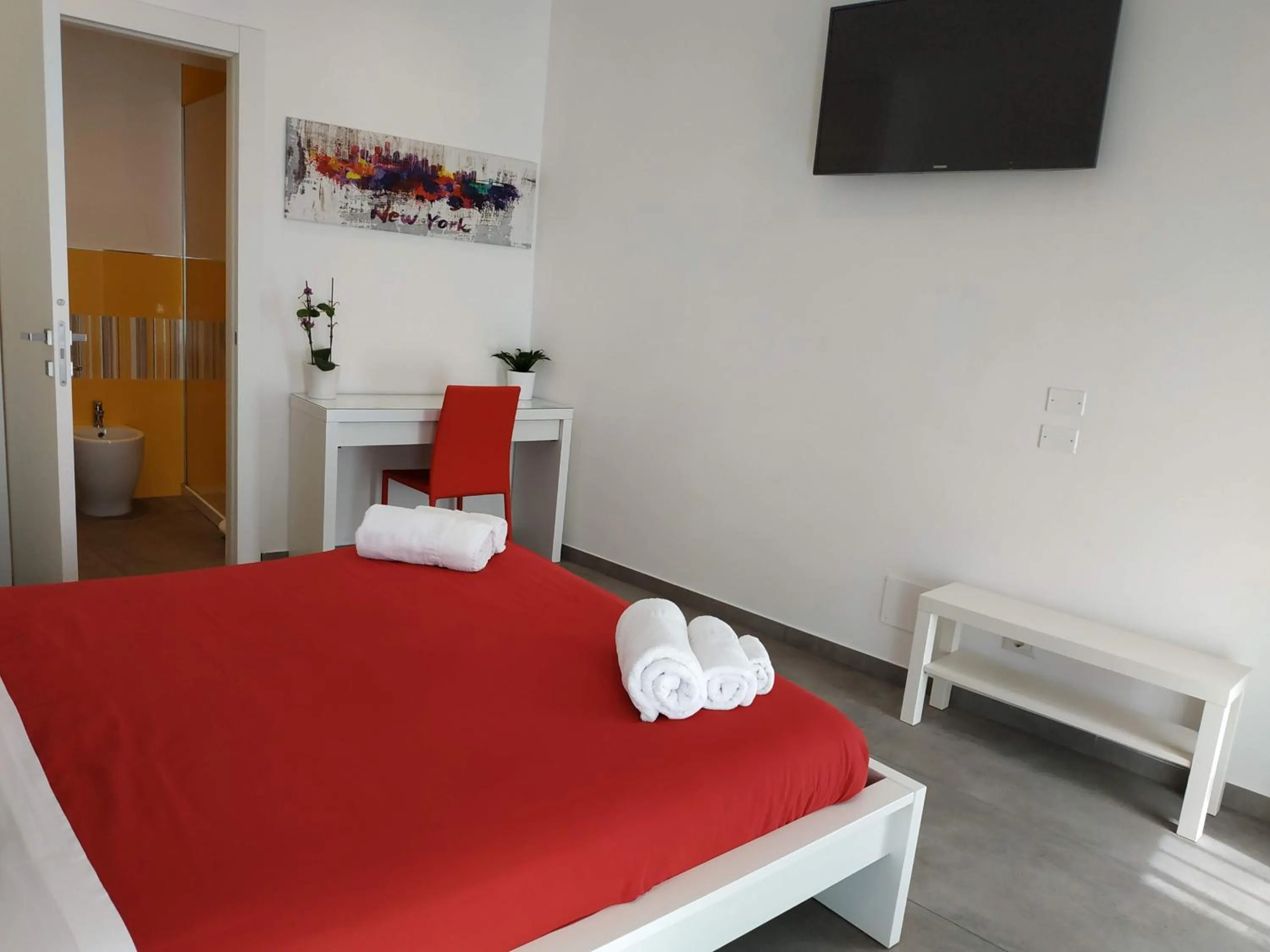 Bed in Palazzo Verdi Holiday Viterbo