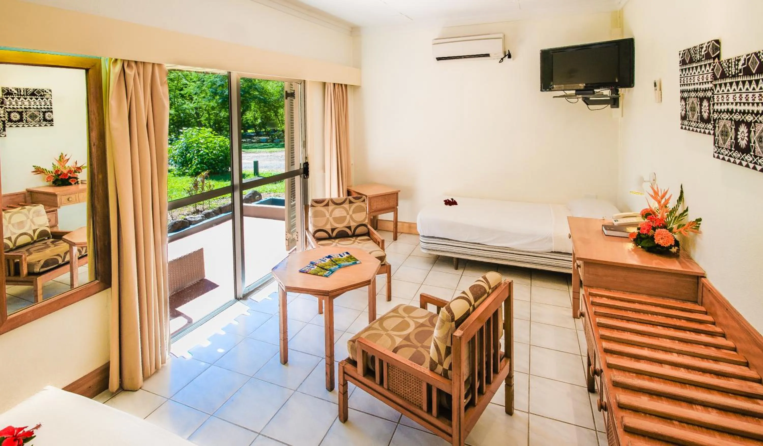Bedroom in Tanoa Skylodge Hotel
