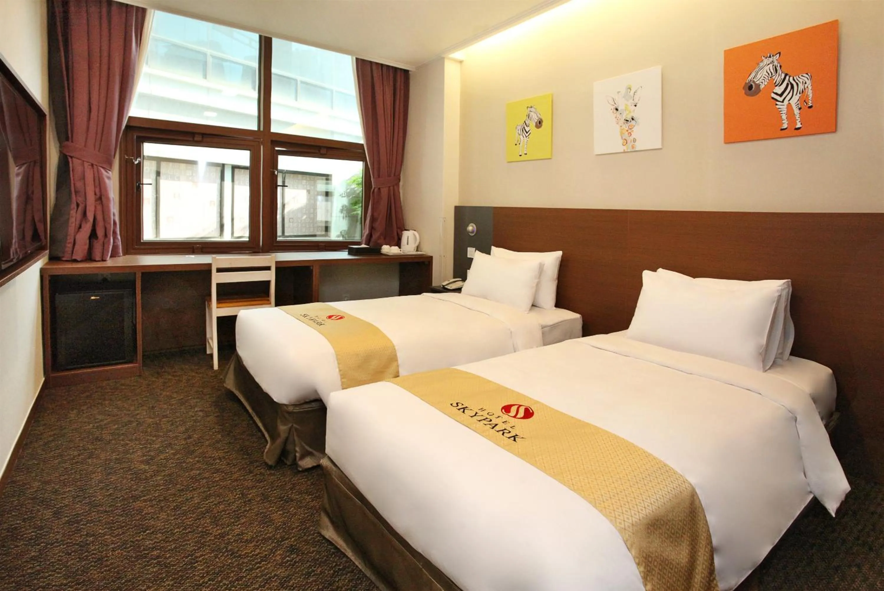 Photo of the whole room, Bed in Hotel Skypark Myeongdong 2
