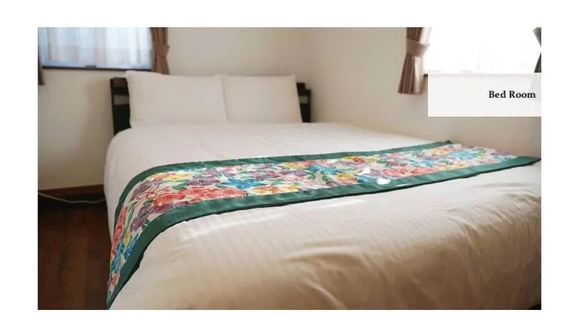 Bed in Scallop Beach Condominium