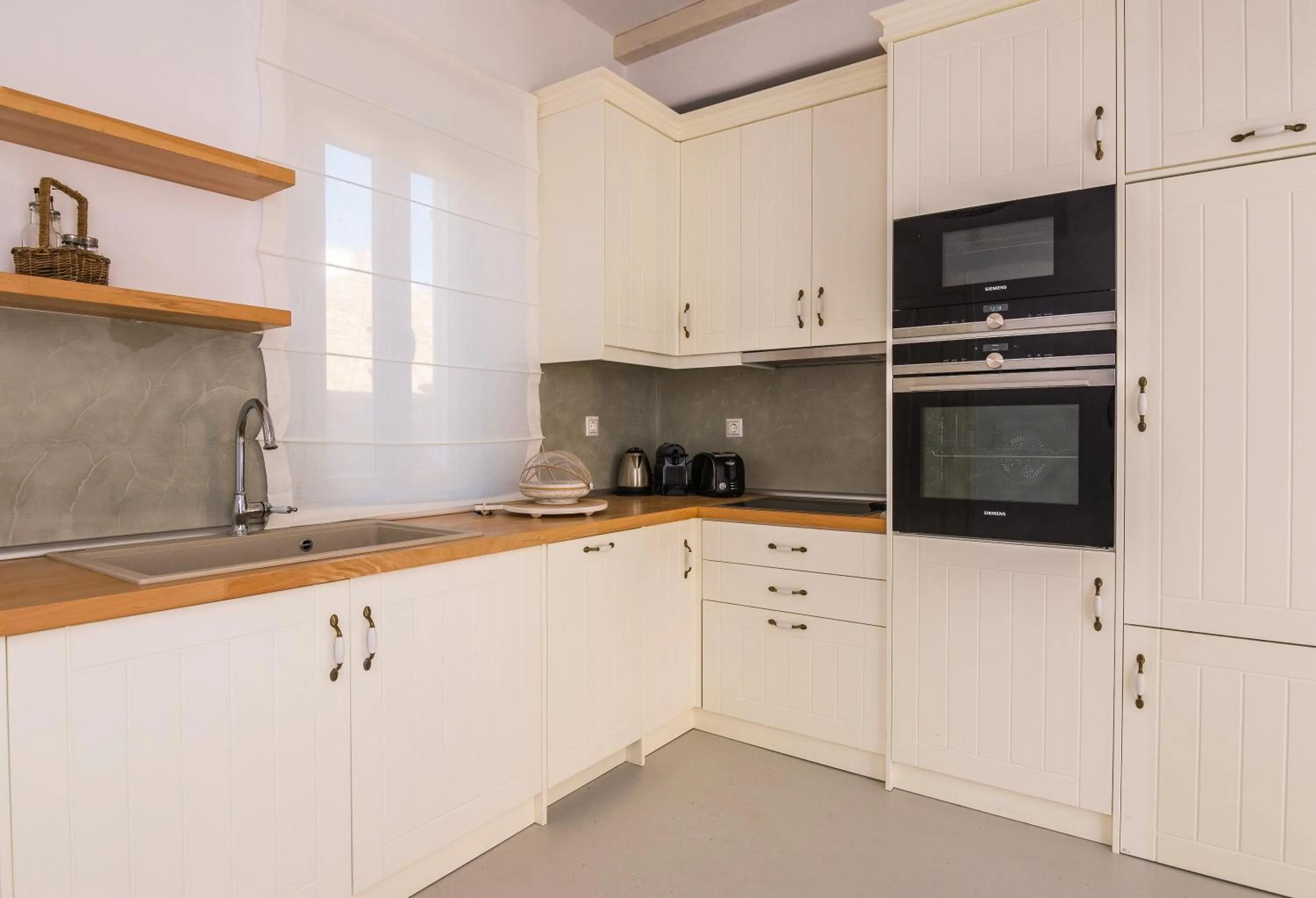 Kitchen or kitchenette in Eden View Suites & Villas