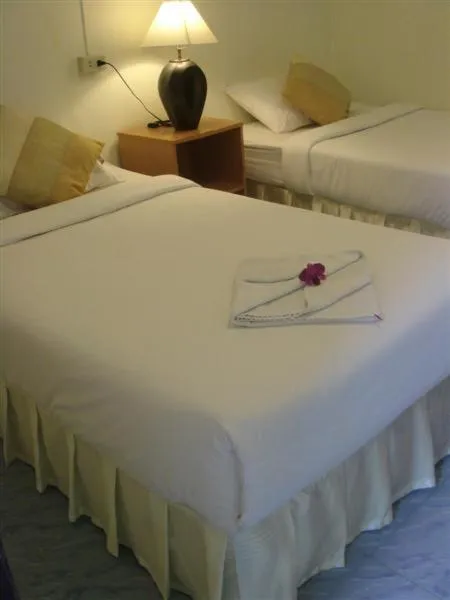 Bed in Baan Rom Mai Resort
