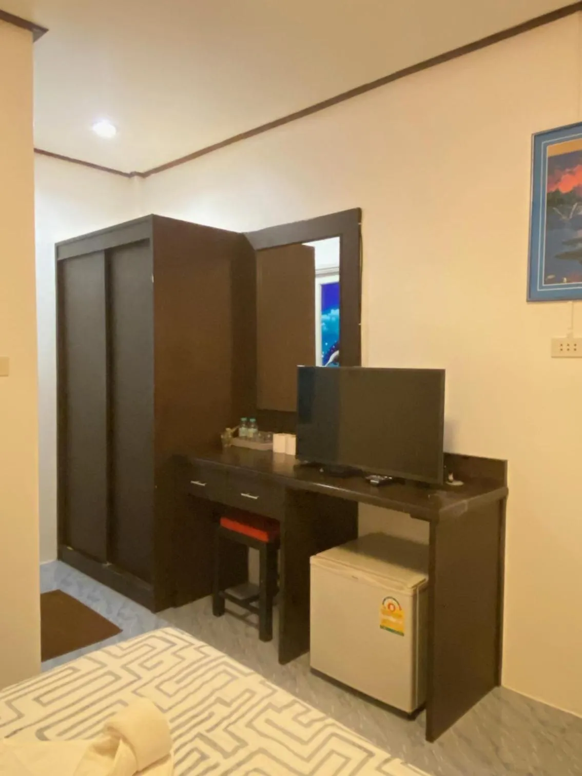 Bed in Baan Rom Mai Resort