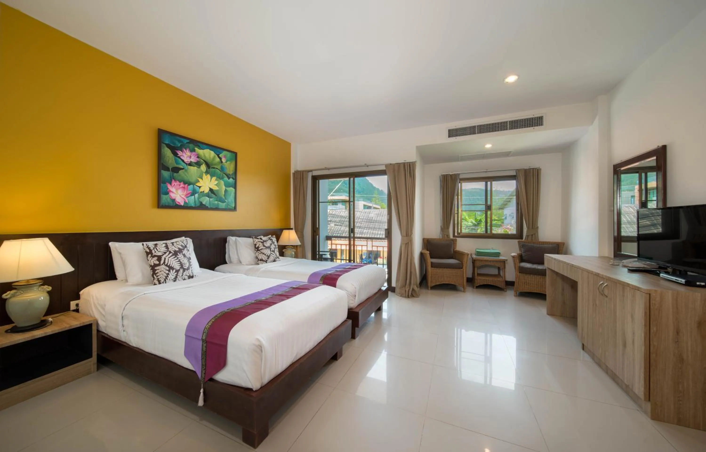 Bed in Kamala Beachfront Apartment