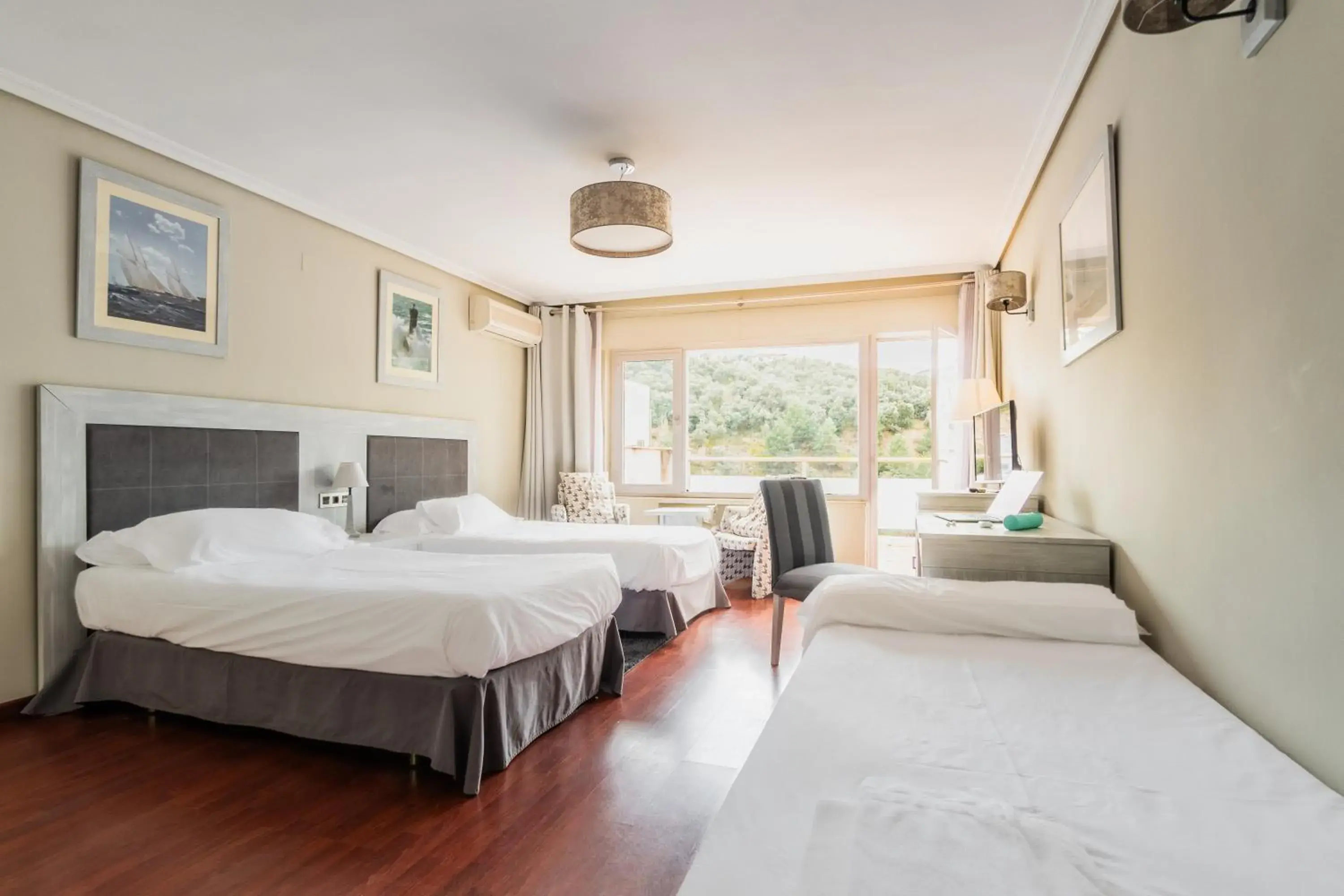 Triple Room in Hotel Náyade Triple Room in Hotel Náyade