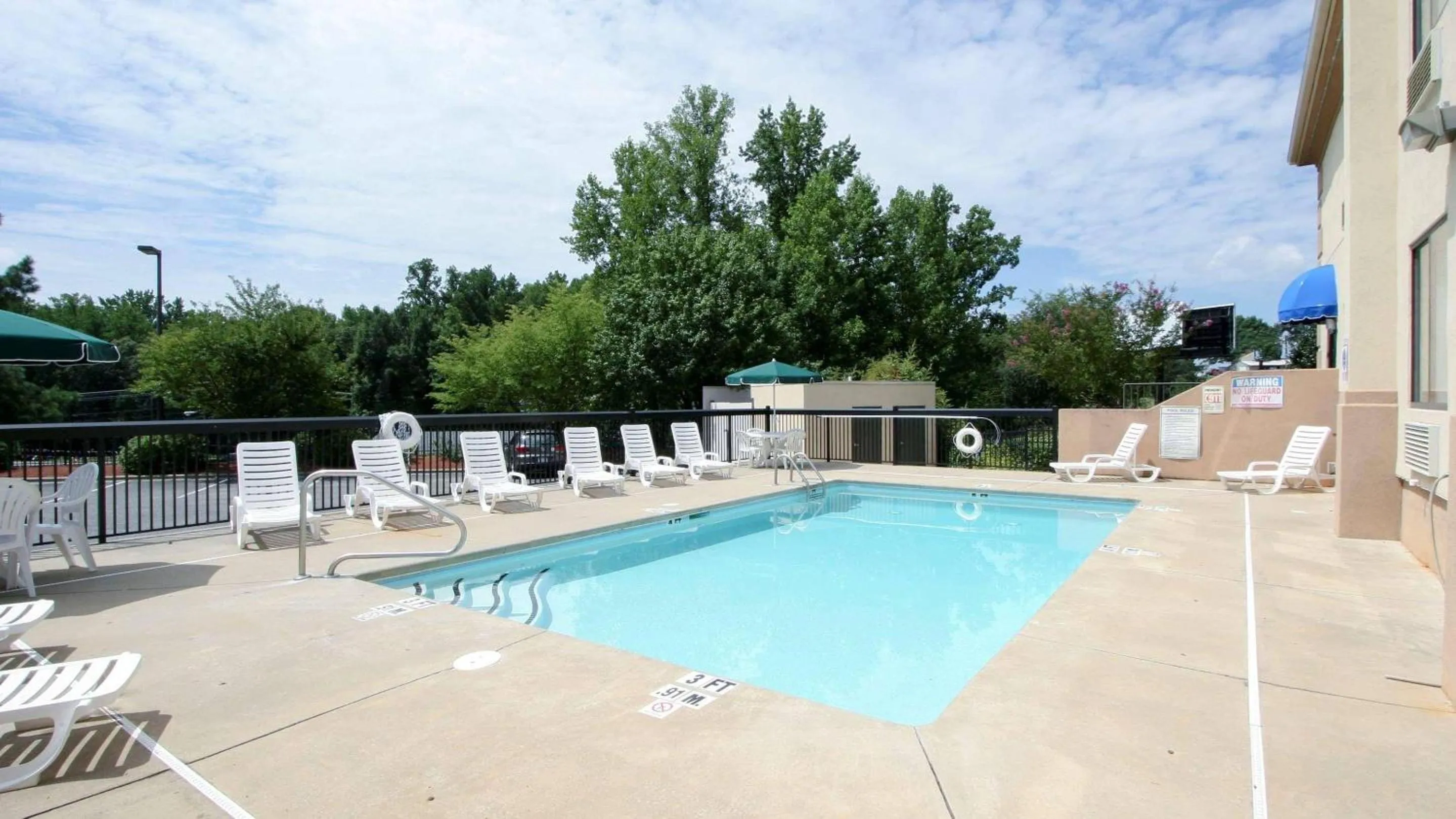 Swimming pool in Country Inn & Suites by Radisson, Shelby, NC