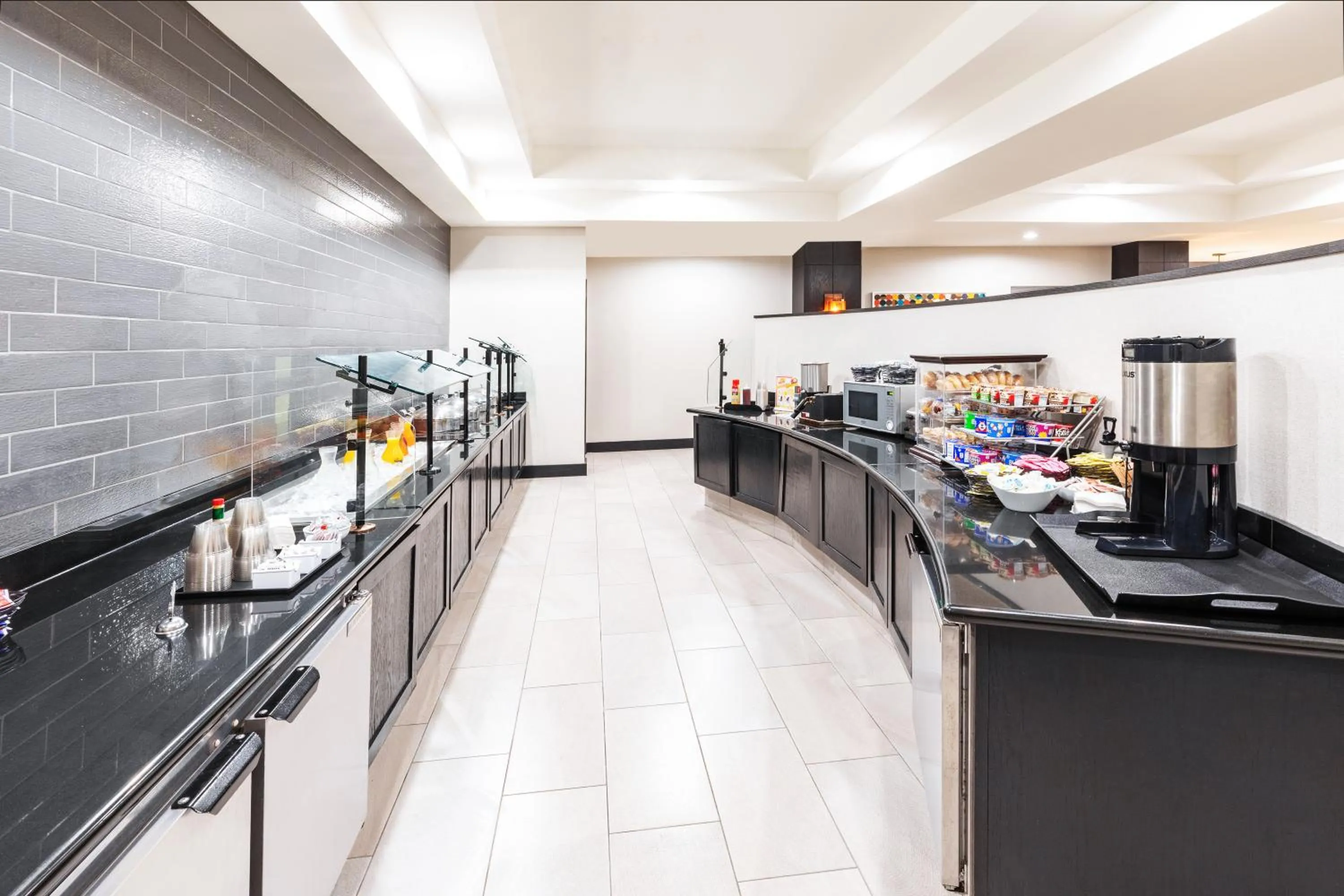 Buffet breakfast in Holiday Inn & Suites Stillwater-University West by IHG