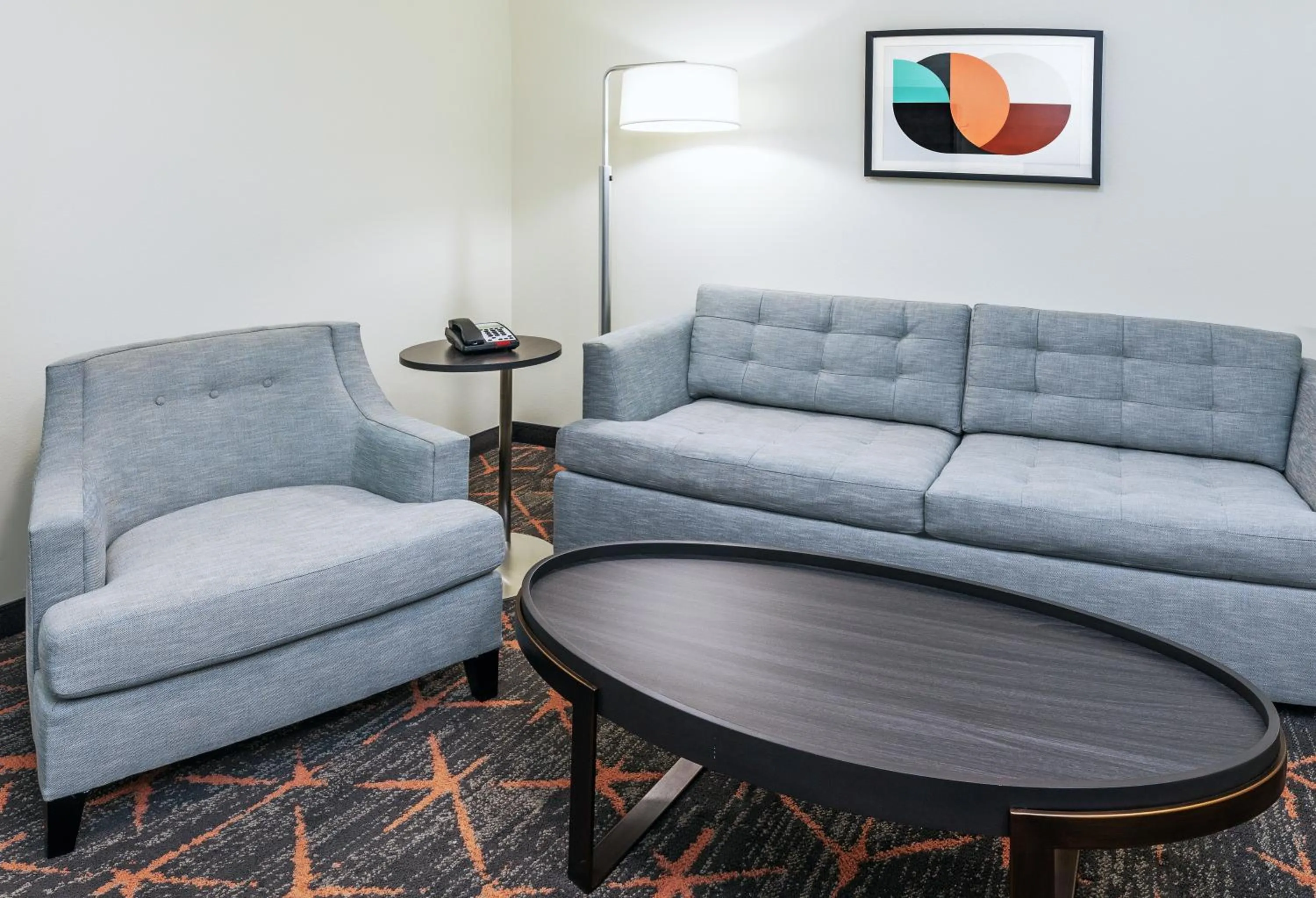 Seating area in Holiday Inn & Suites Stillwater-University West by IHG