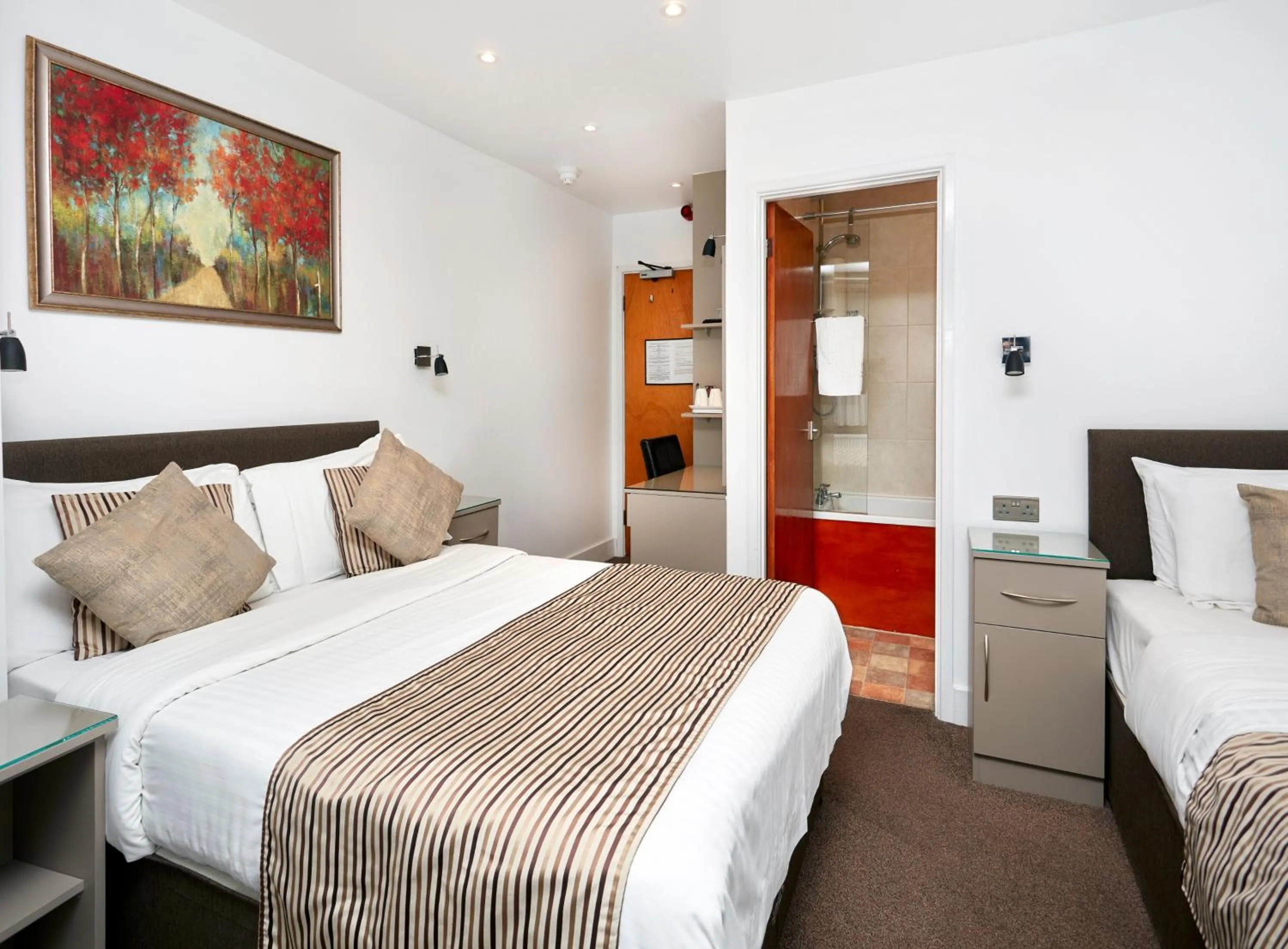 Bed in Conifers Guest House