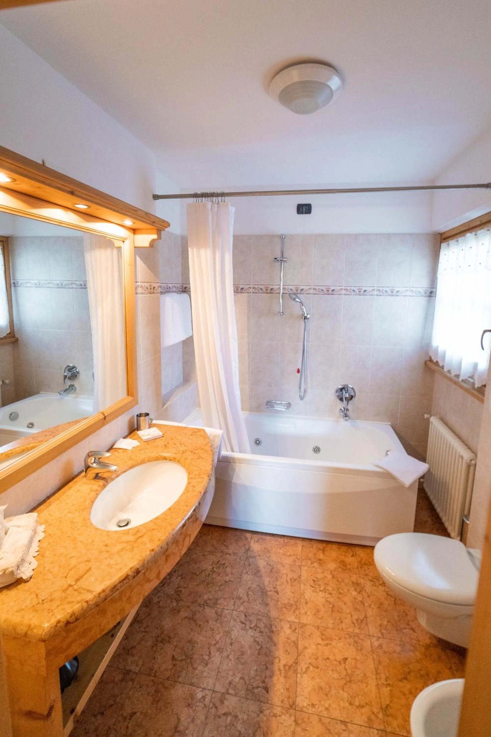 Bathroom in Alpi & Golf Hotel