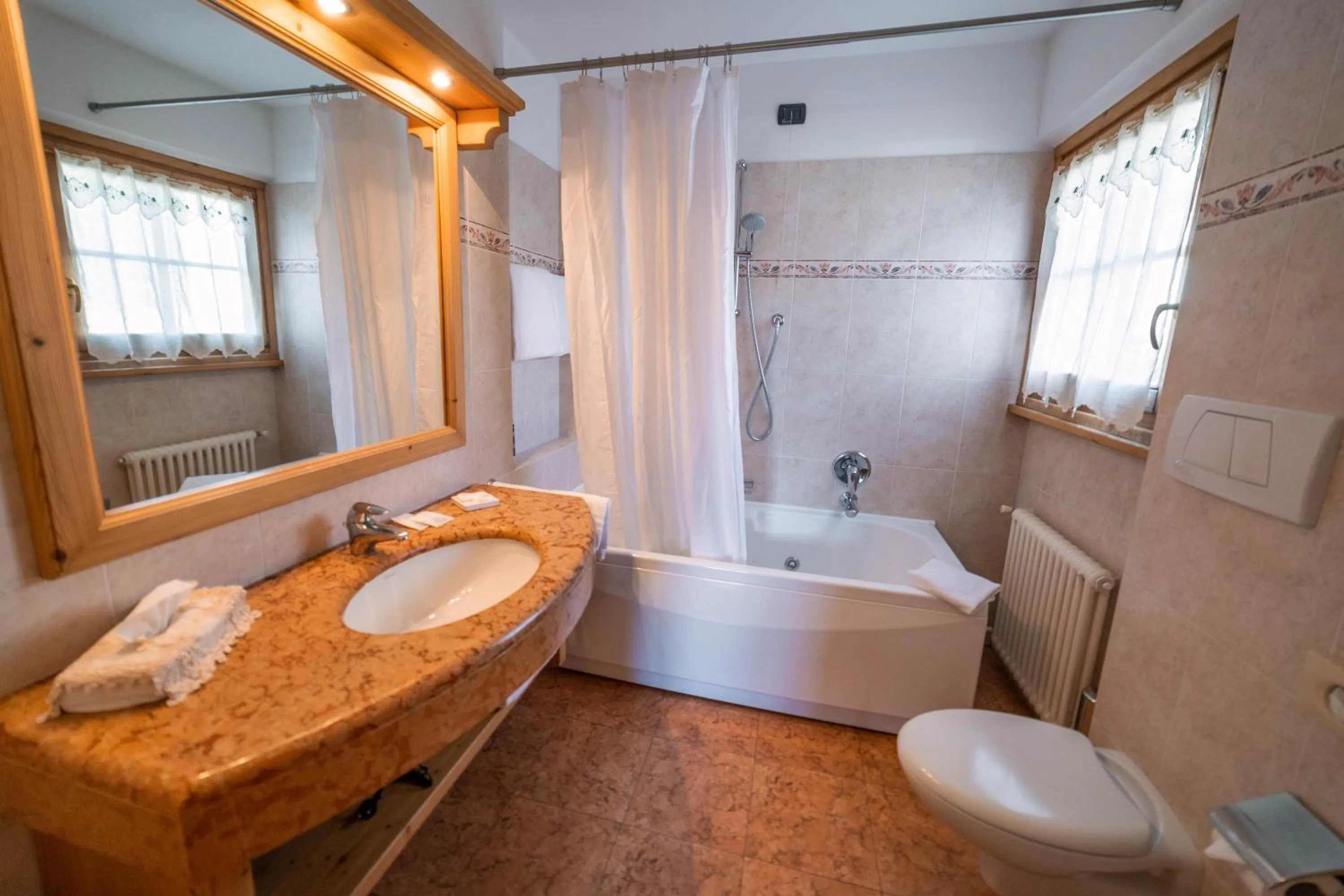 Bathroom in Alpi & Golf Hotel