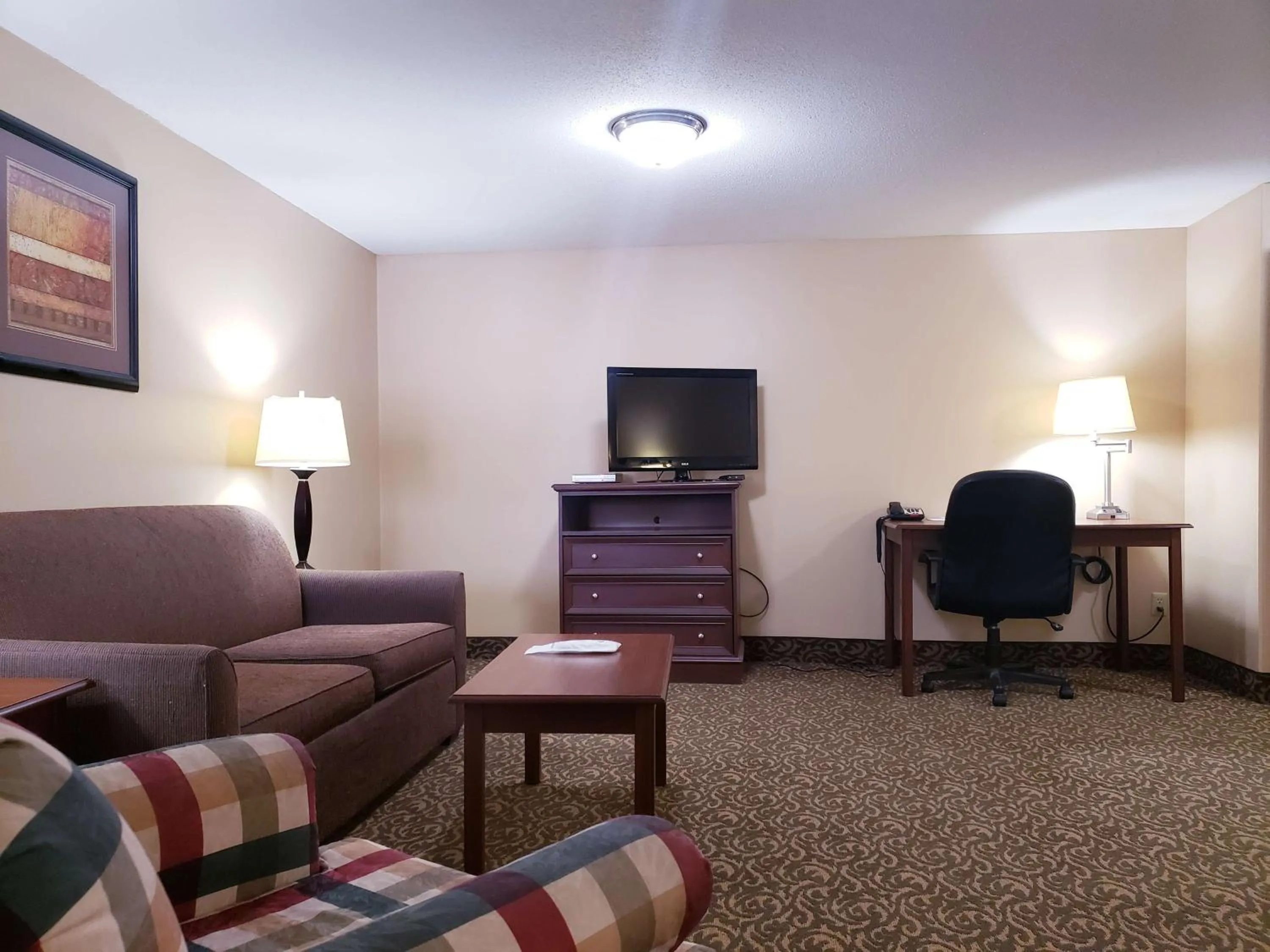 King Suite with Bath Tub and Sofa Bed - Mobility Accessible/Non-Smoking in SureStay Plus Hotel by Best Western Black River Falls
