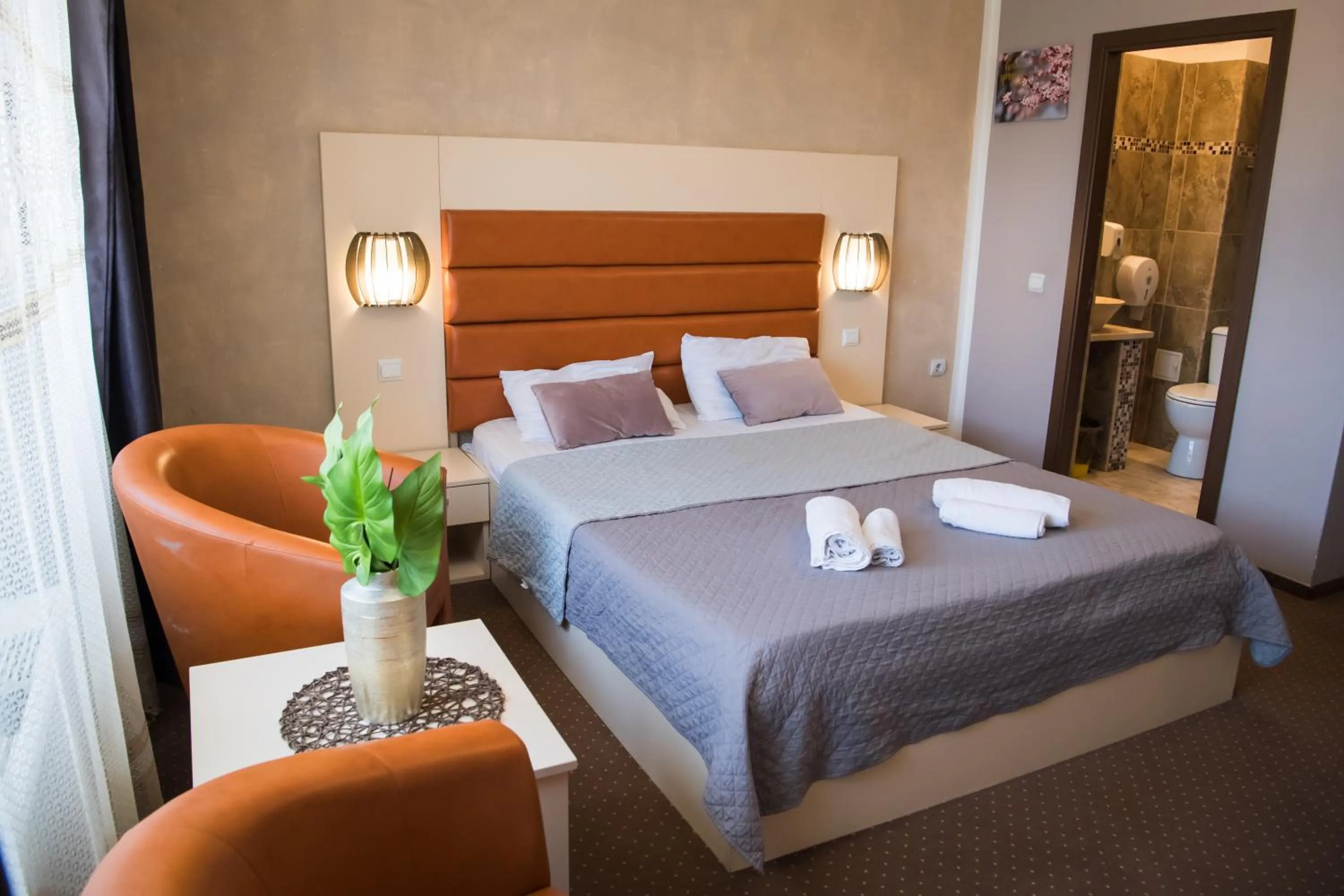 Bed in MBI Travel Inn