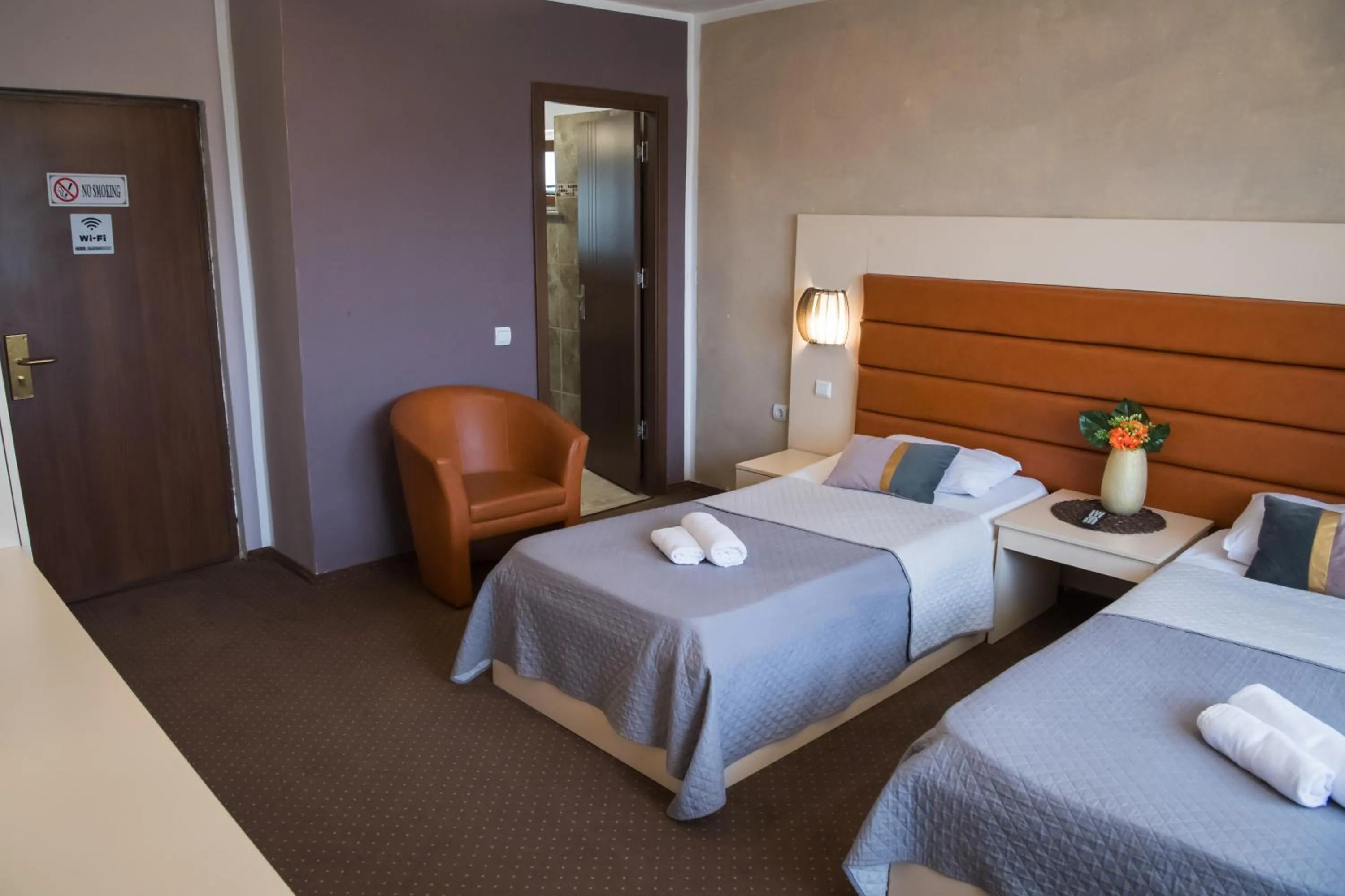 Bed in MBI Travel Inn