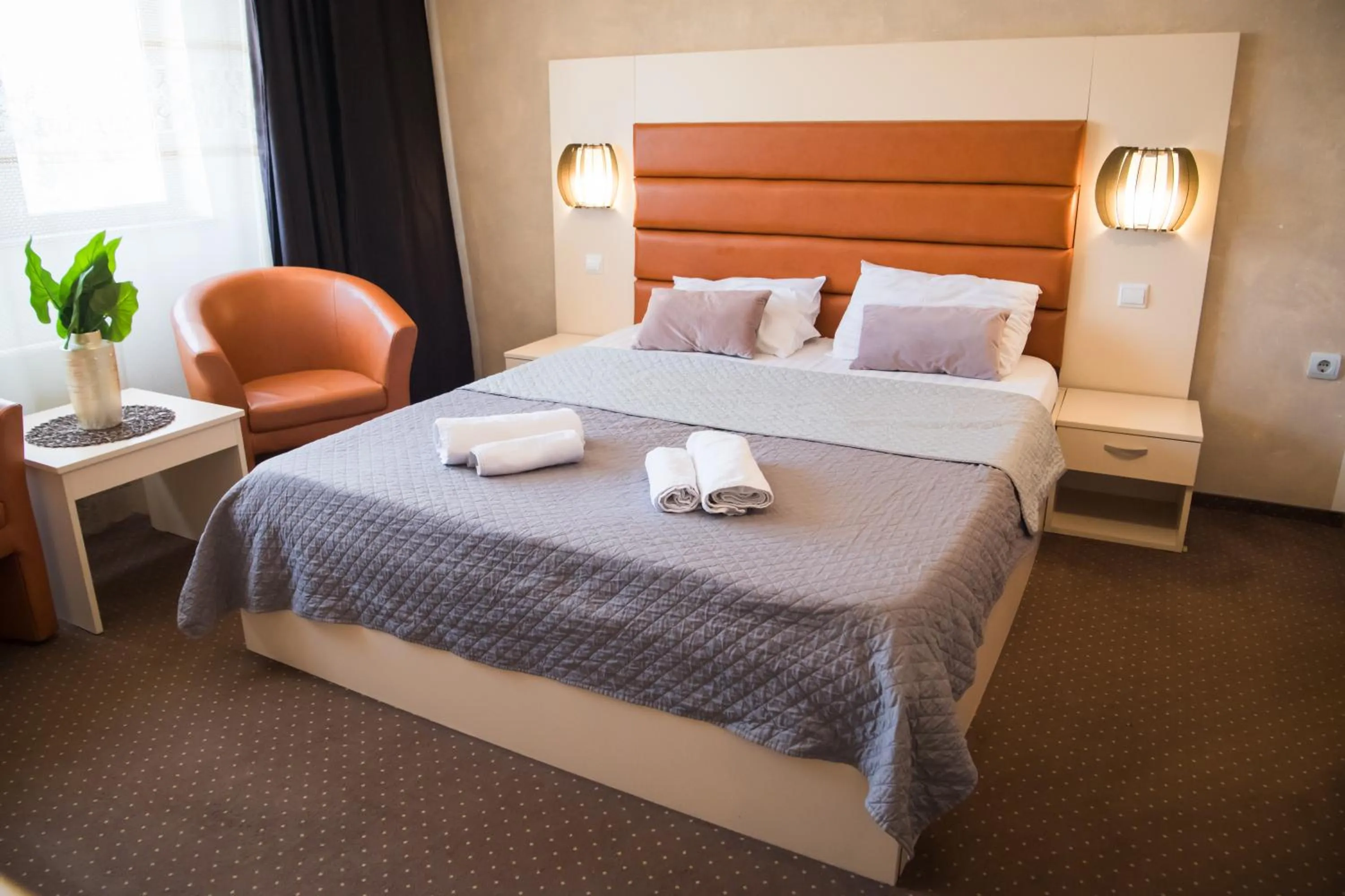 Bed in MBI Travel Inn