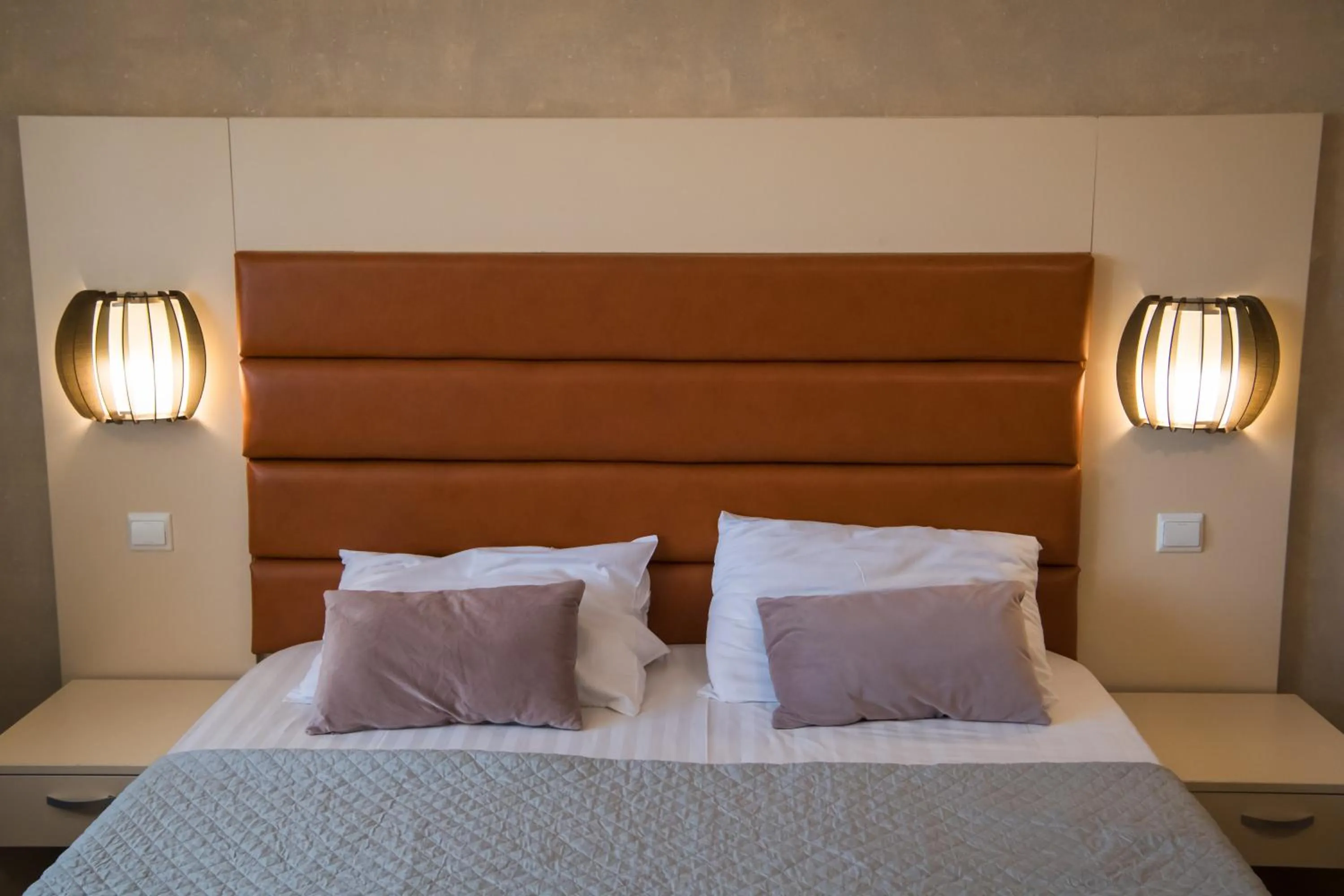 Bed in MBI Travel Inn