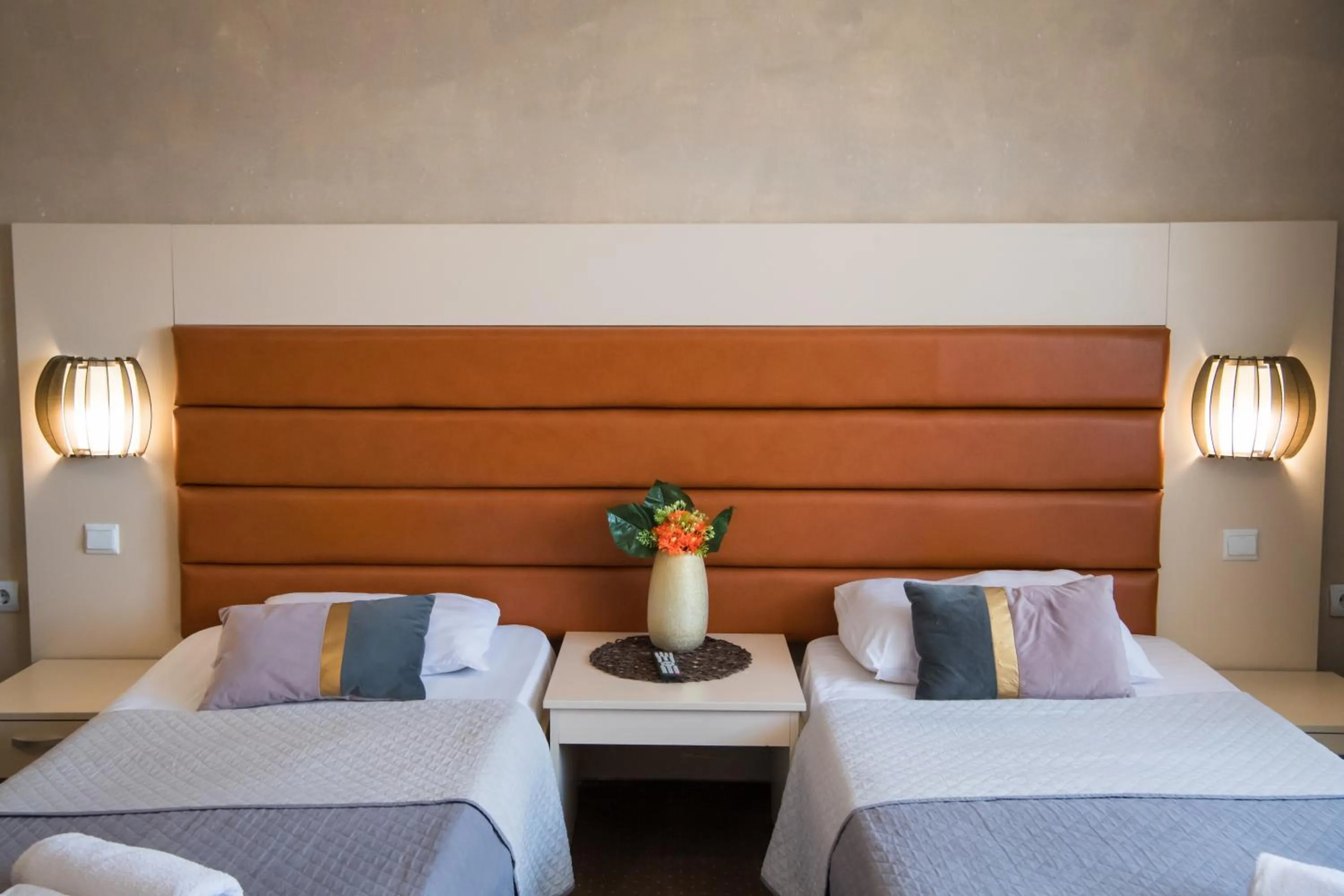 Bed in MBI Travel Inn