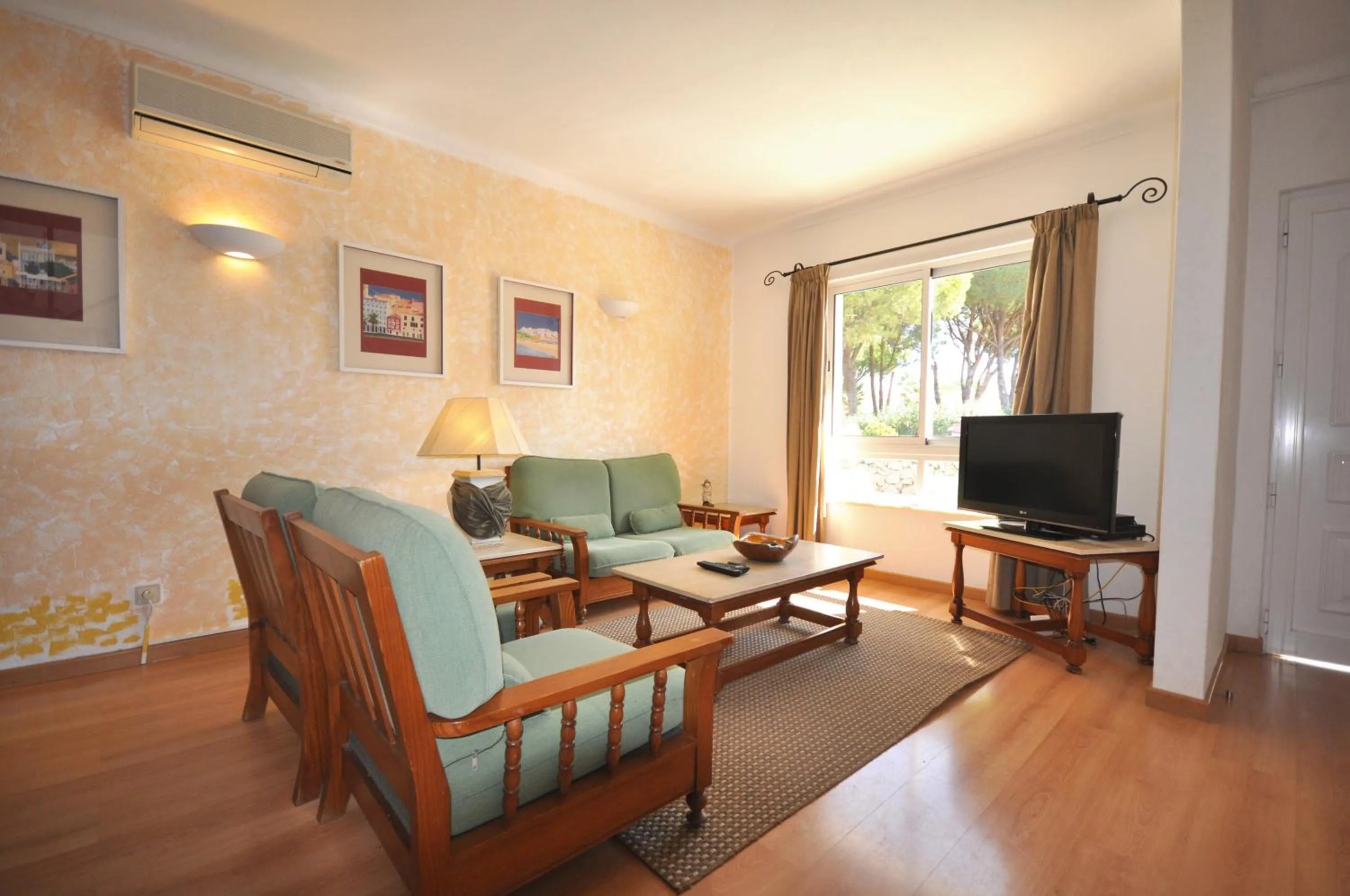 Communal lounge/ TV room in Modern, comfortable and well equipped private pool villa