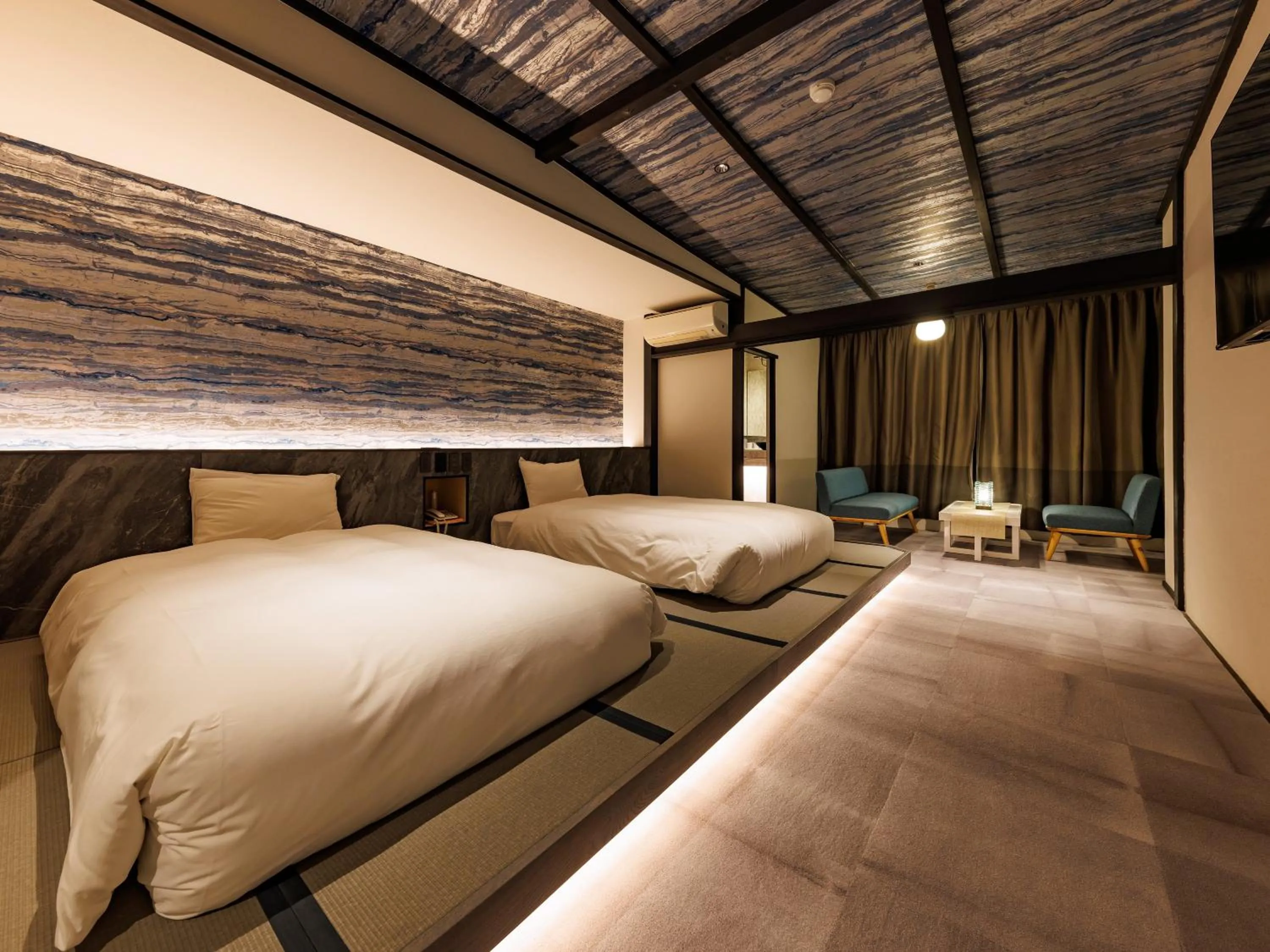 Bed in Kurofune Hotel