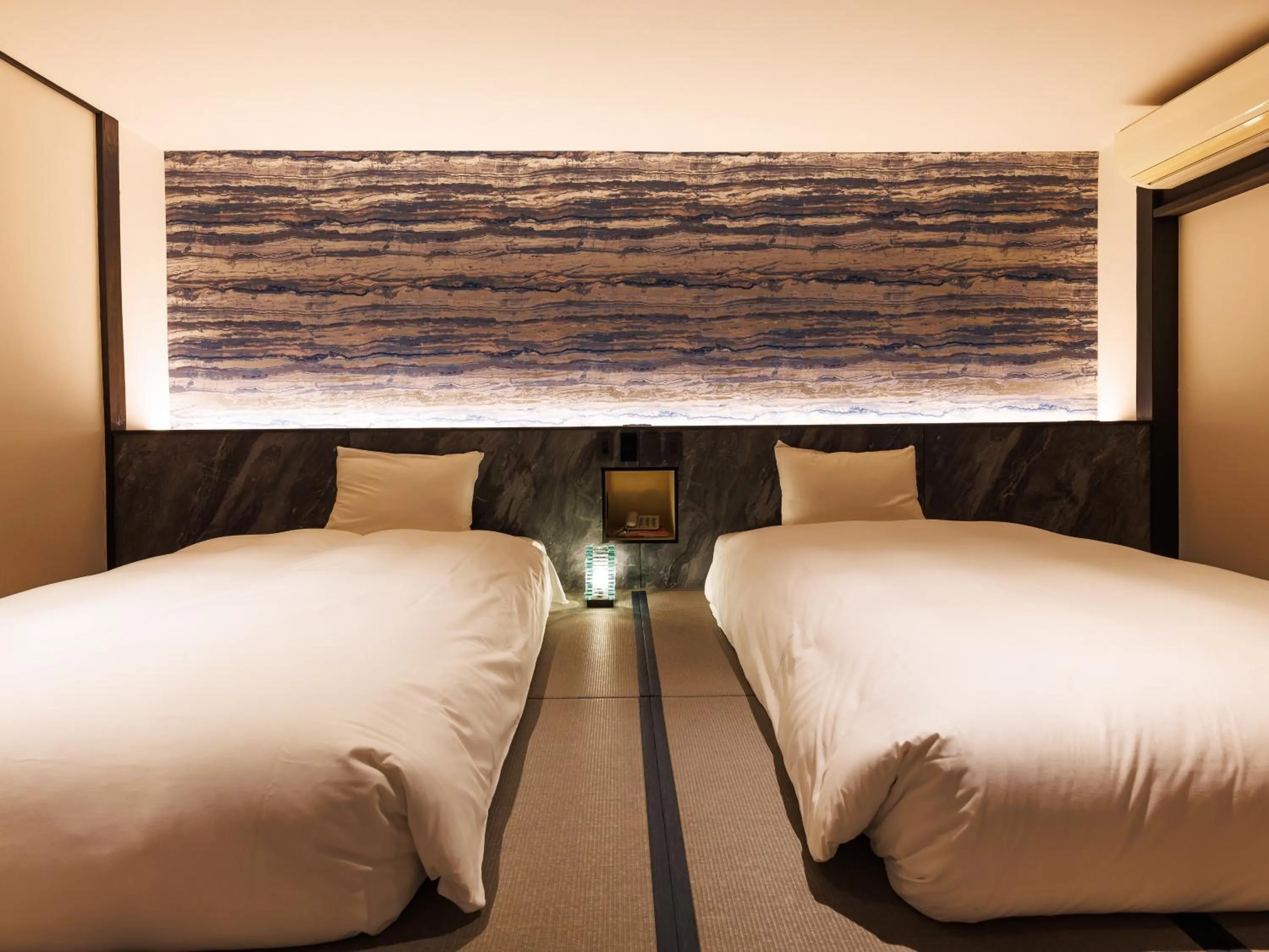 Bed in Kurofune Hotel