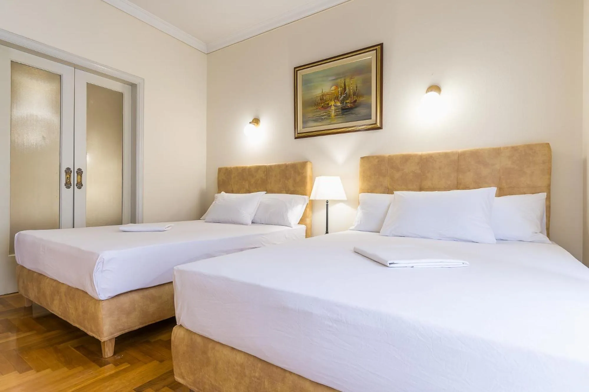 Bed in Victoria Queens Paradise Apartments