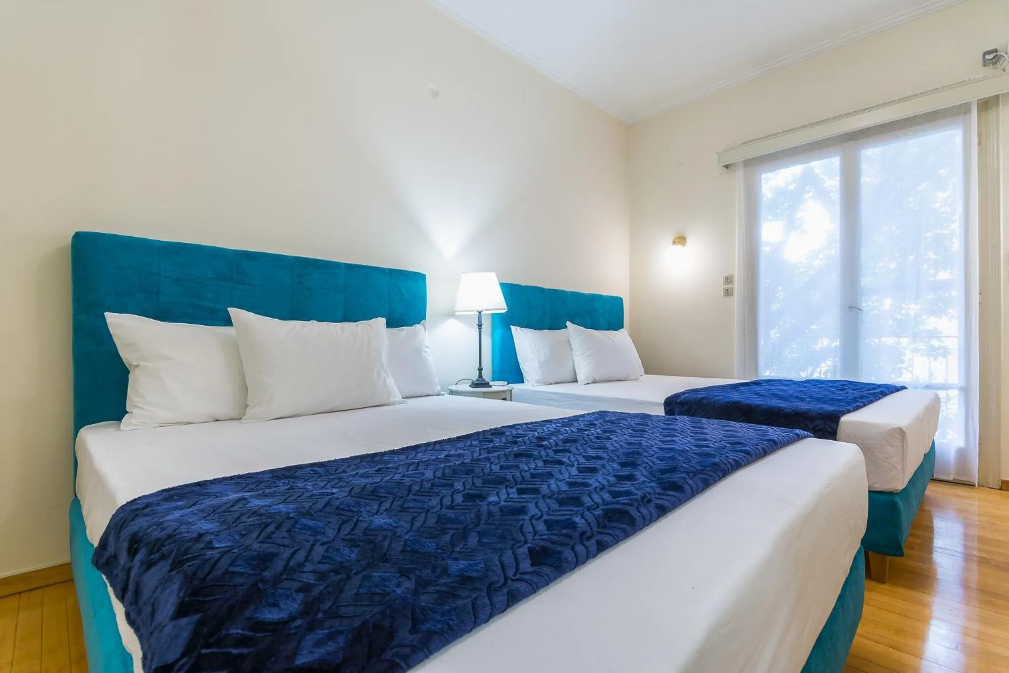 Bed in Victoria Queens Paradise Apartments