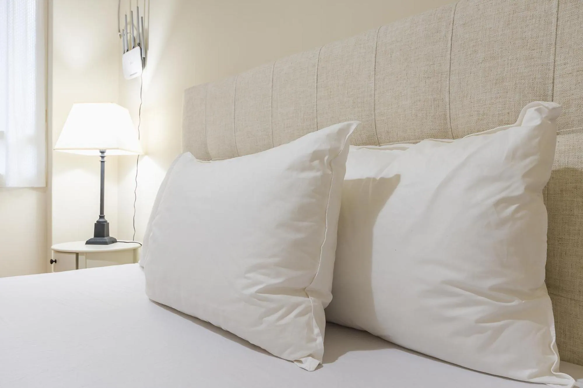 Bed in Victoria Queens Paradise Apartments