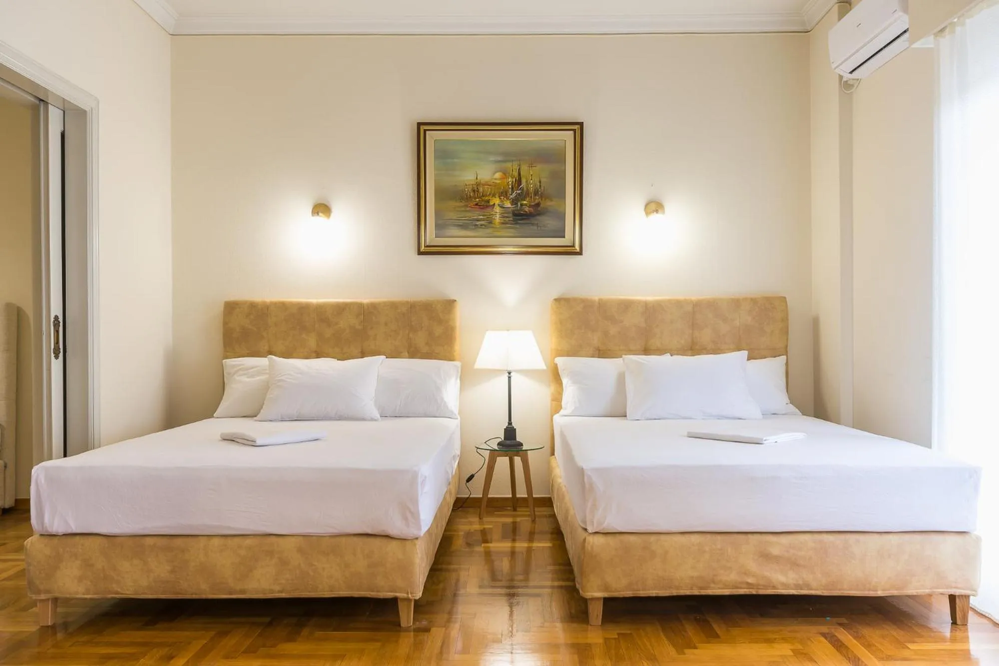 Bed in Victoria Queens Paradise Apartments