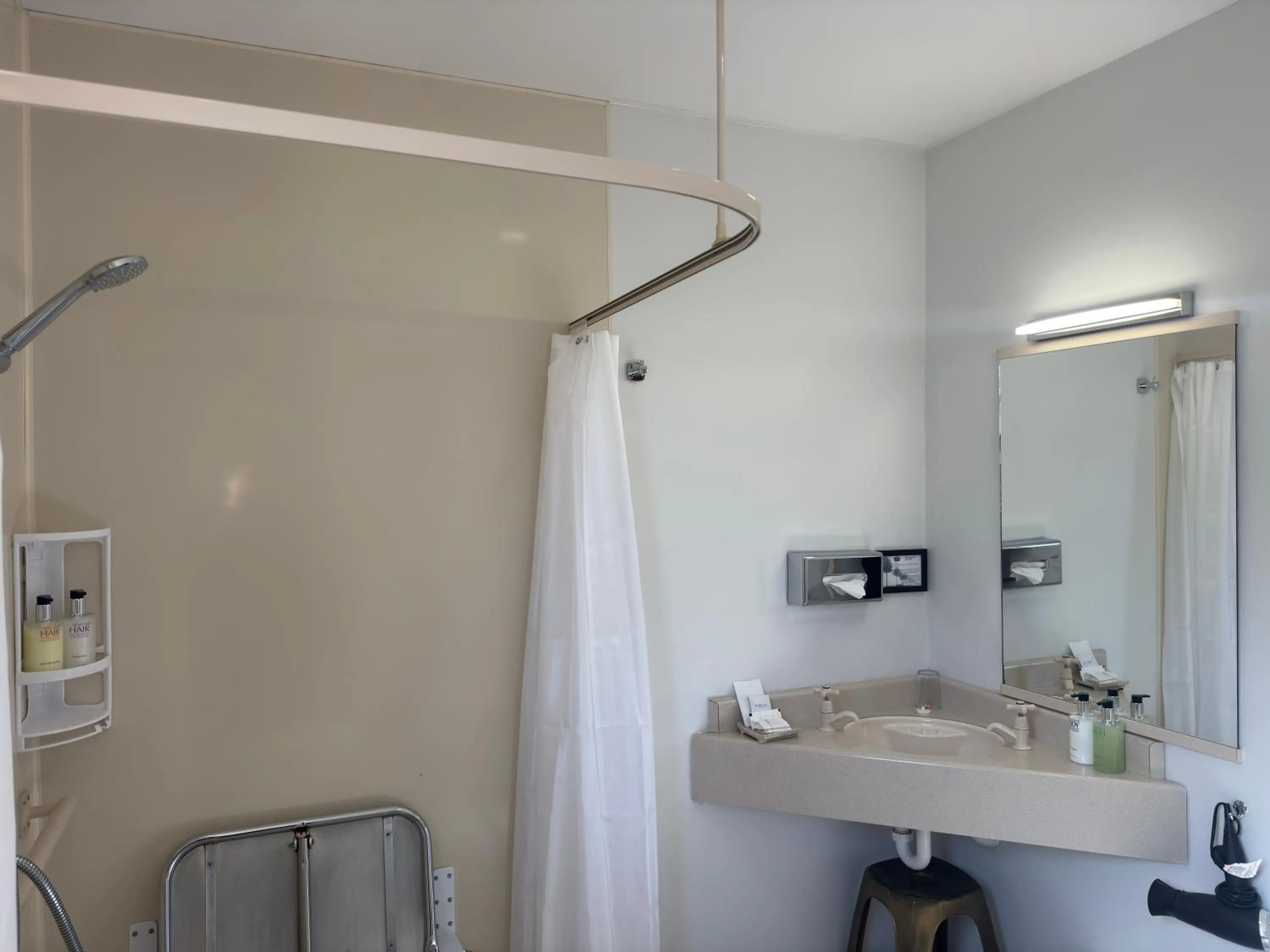 Bathroom in ASURE Ambassador Motor Lodge