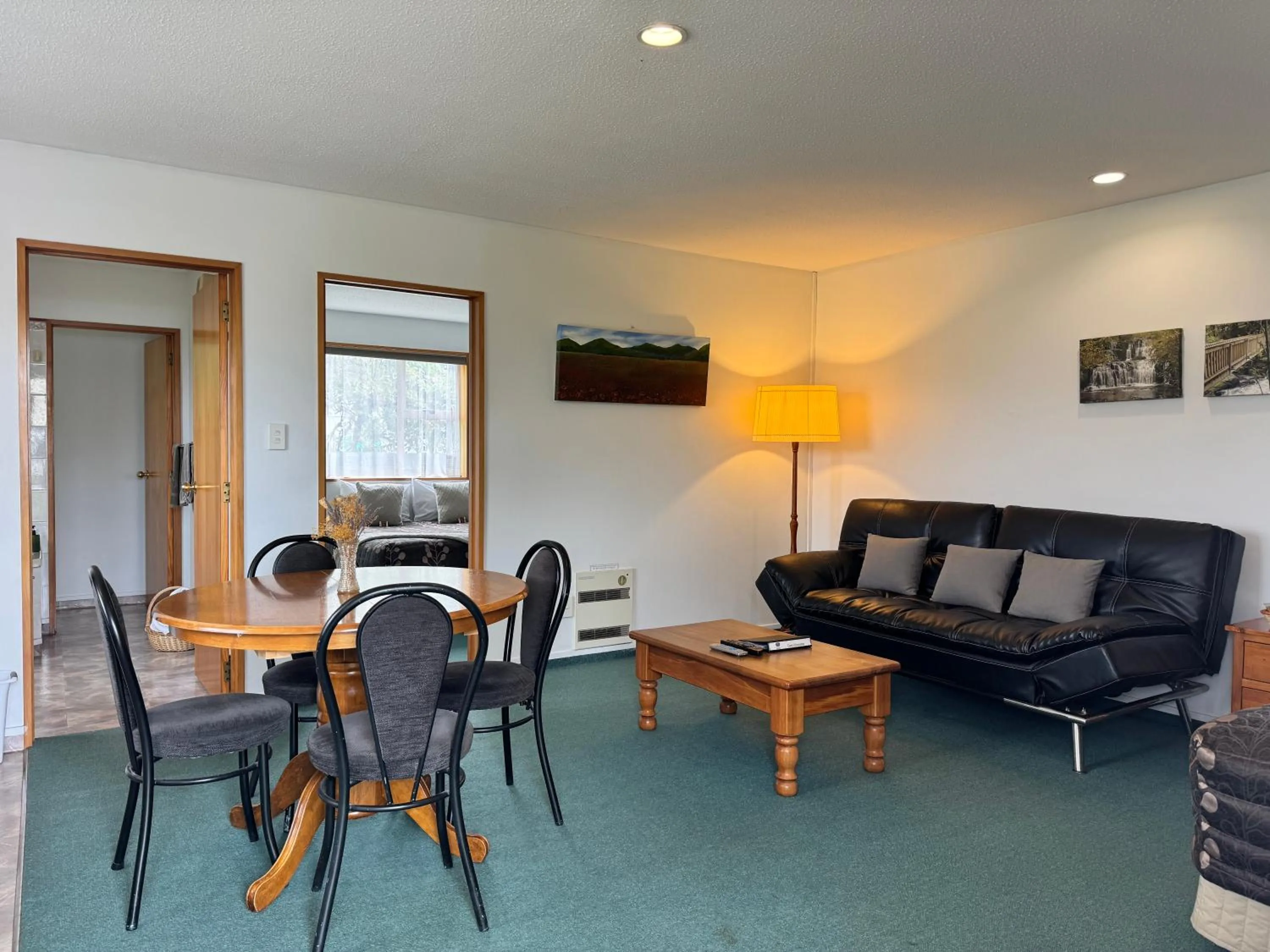 Dining area in ASURE Ambassador Motor Lodge