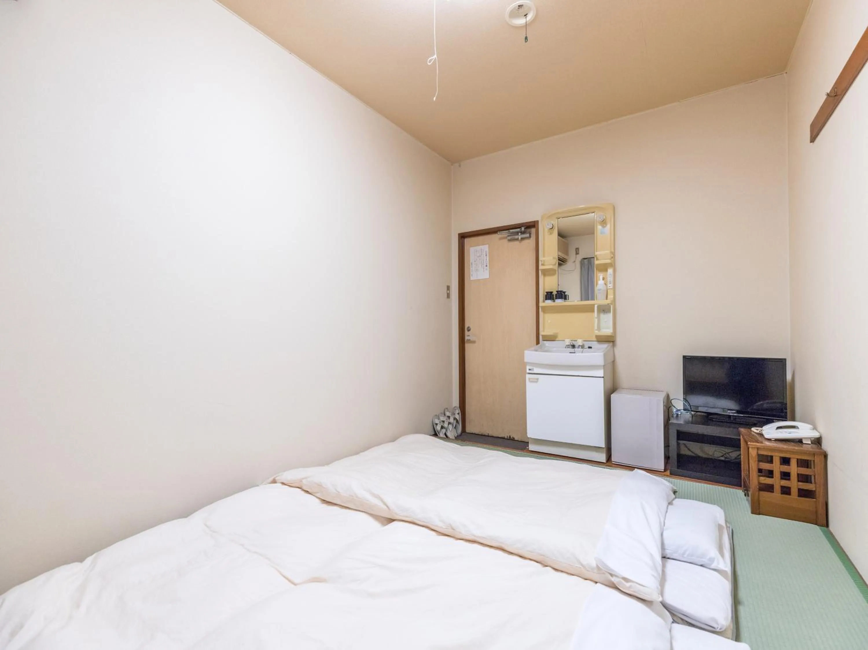 Bed in Hotel Isesaki East