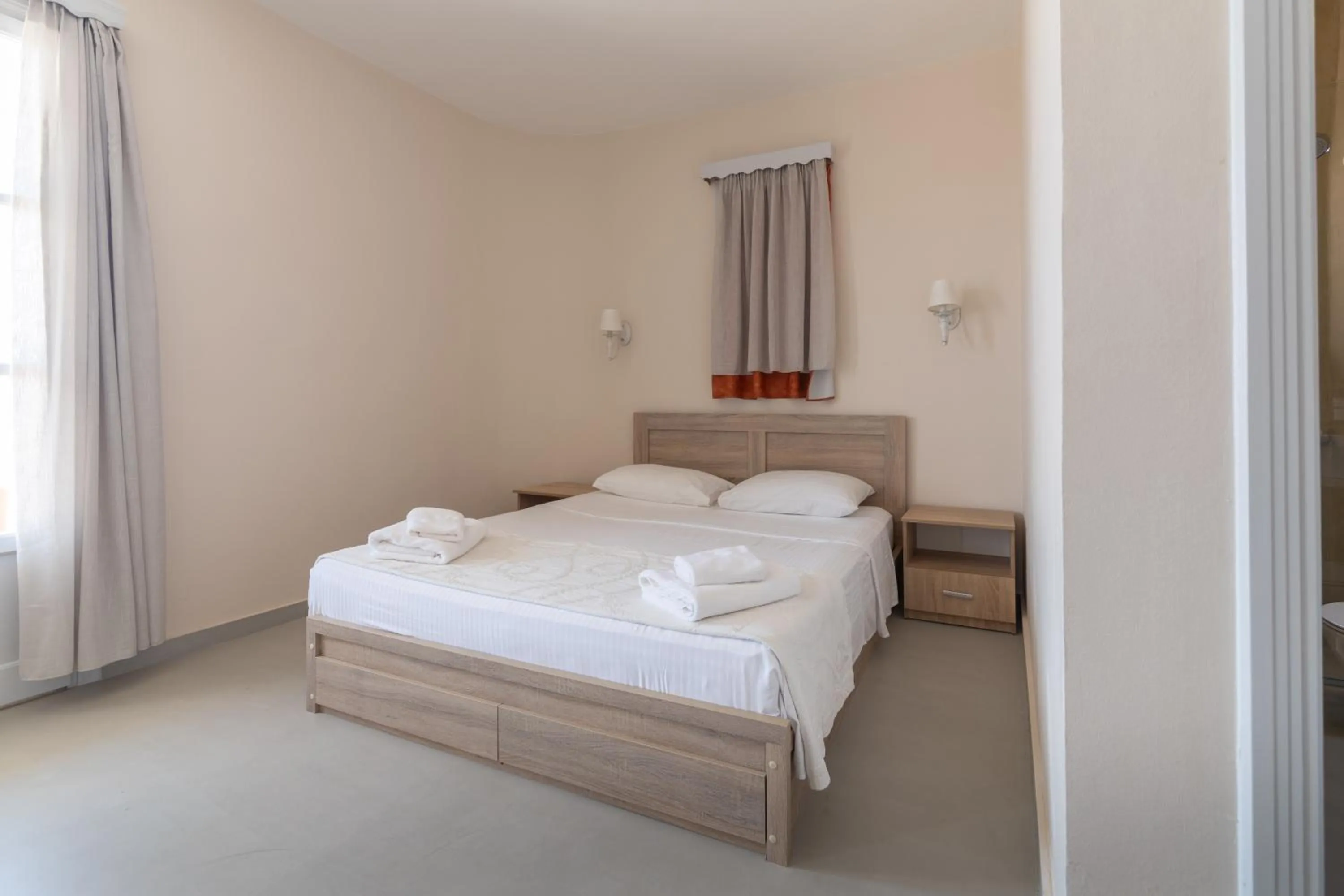 Bed in Red Tower Hotel