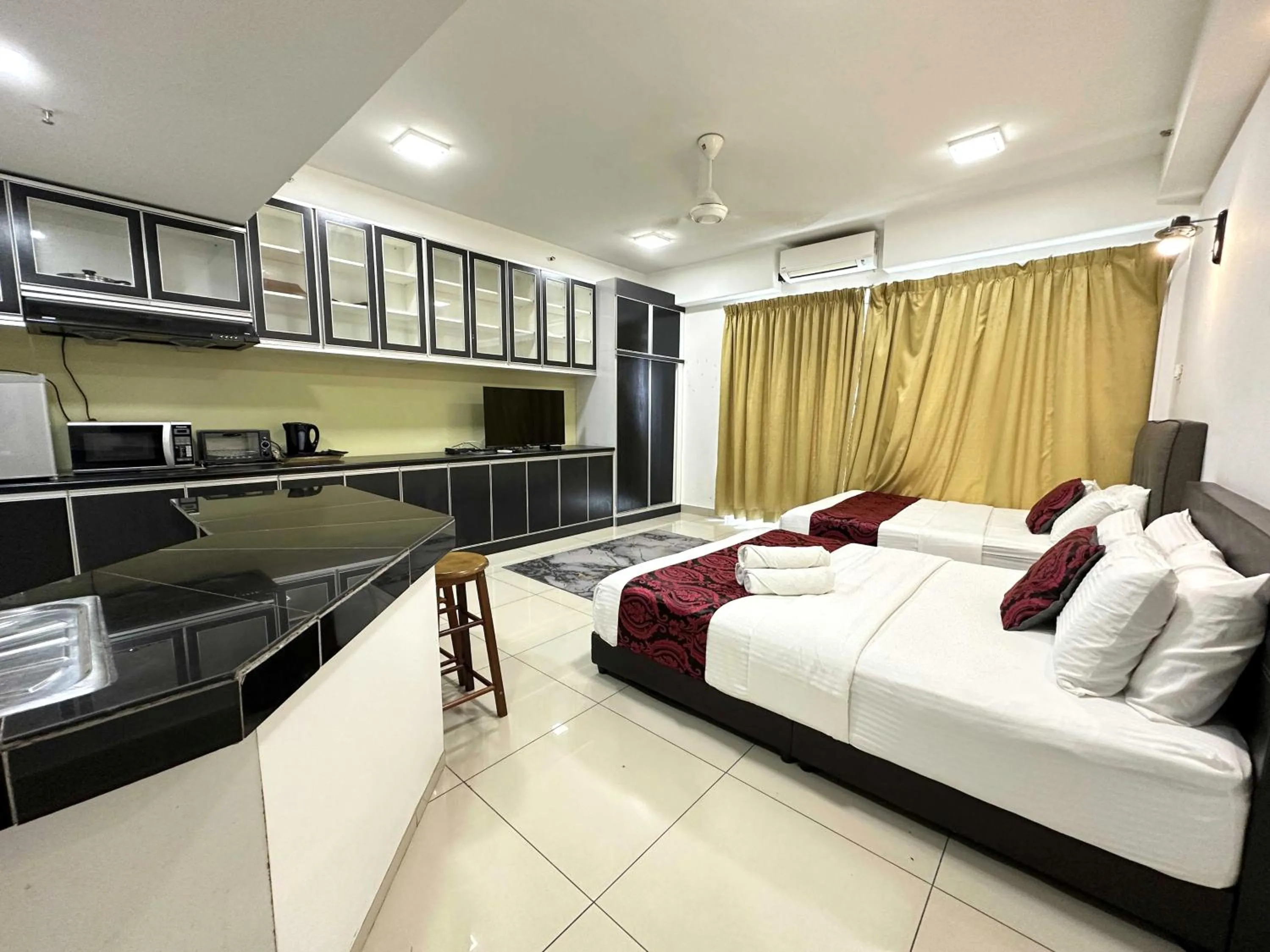 Photo of the whole room, Bed in Cahaya Qaira Homestay @ D'Perdana Kota Bharu